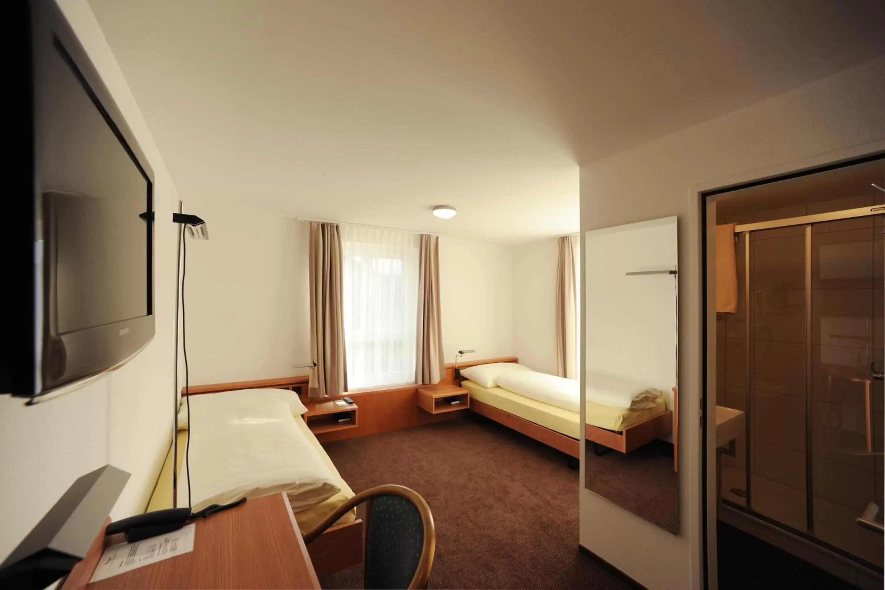 Classic Twin Room in Hotel Freihof Swiss Lodge Classic Twin Room in Hotel Freihof Swiss Lodge