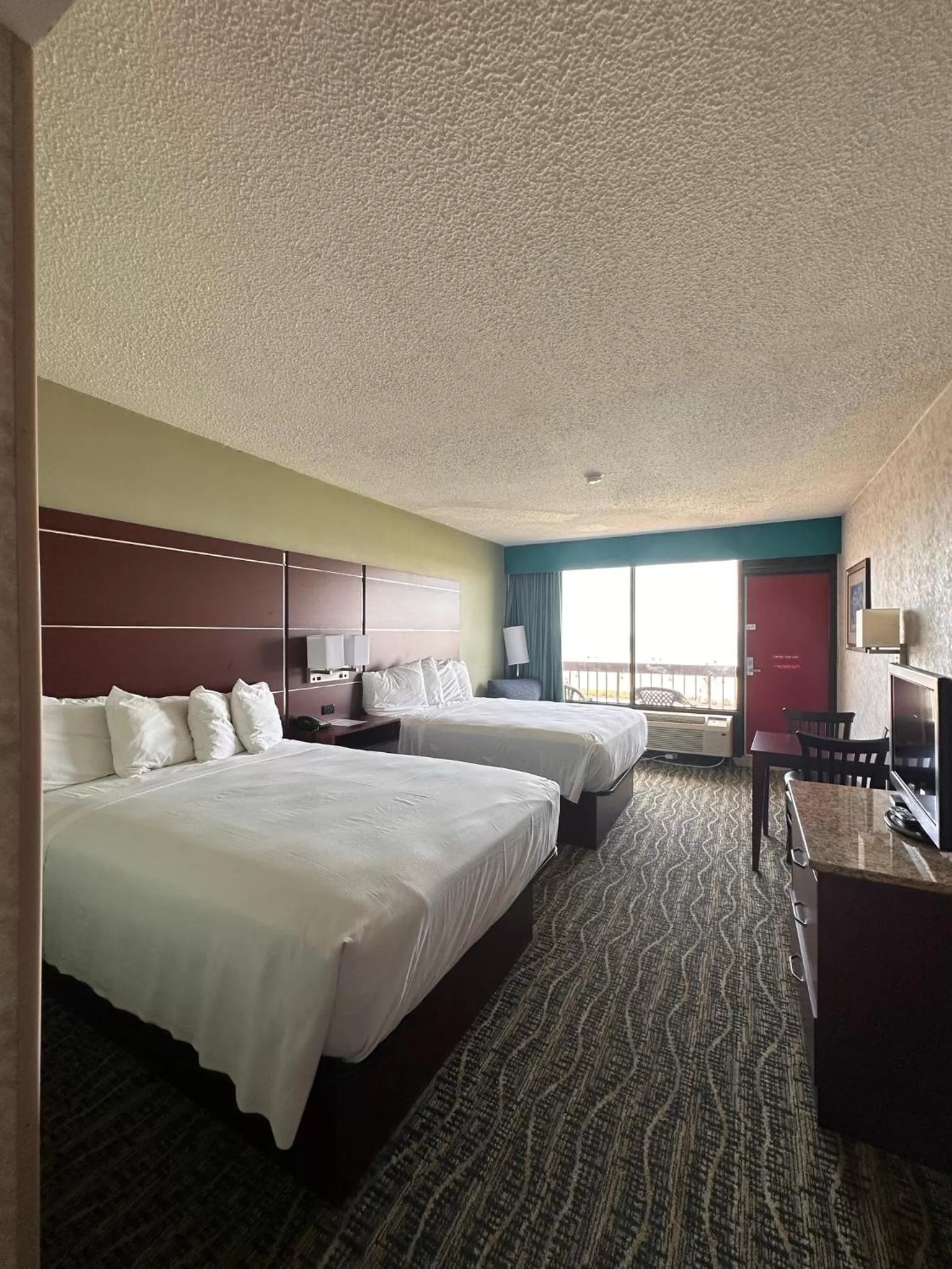 Bedroom in The Breakers Resort Inn