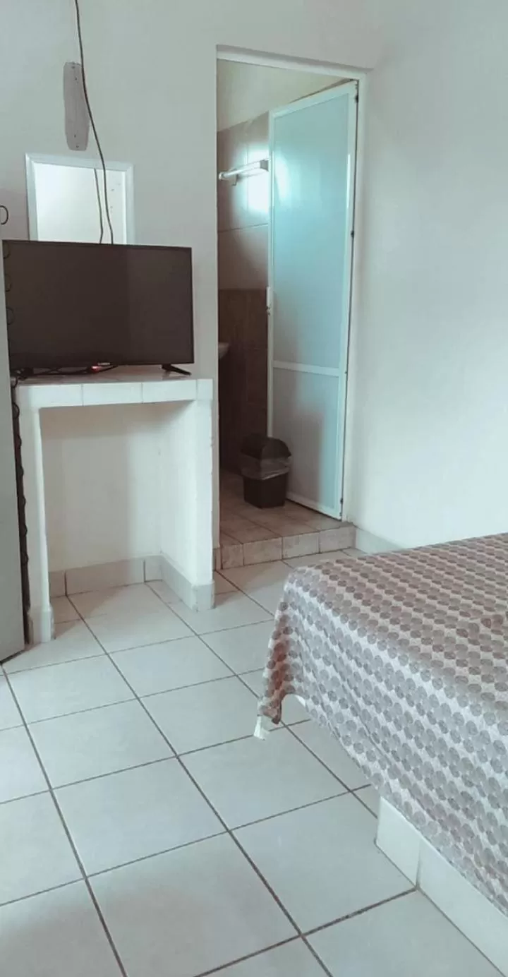 Bed in Bungalows Casa Regina