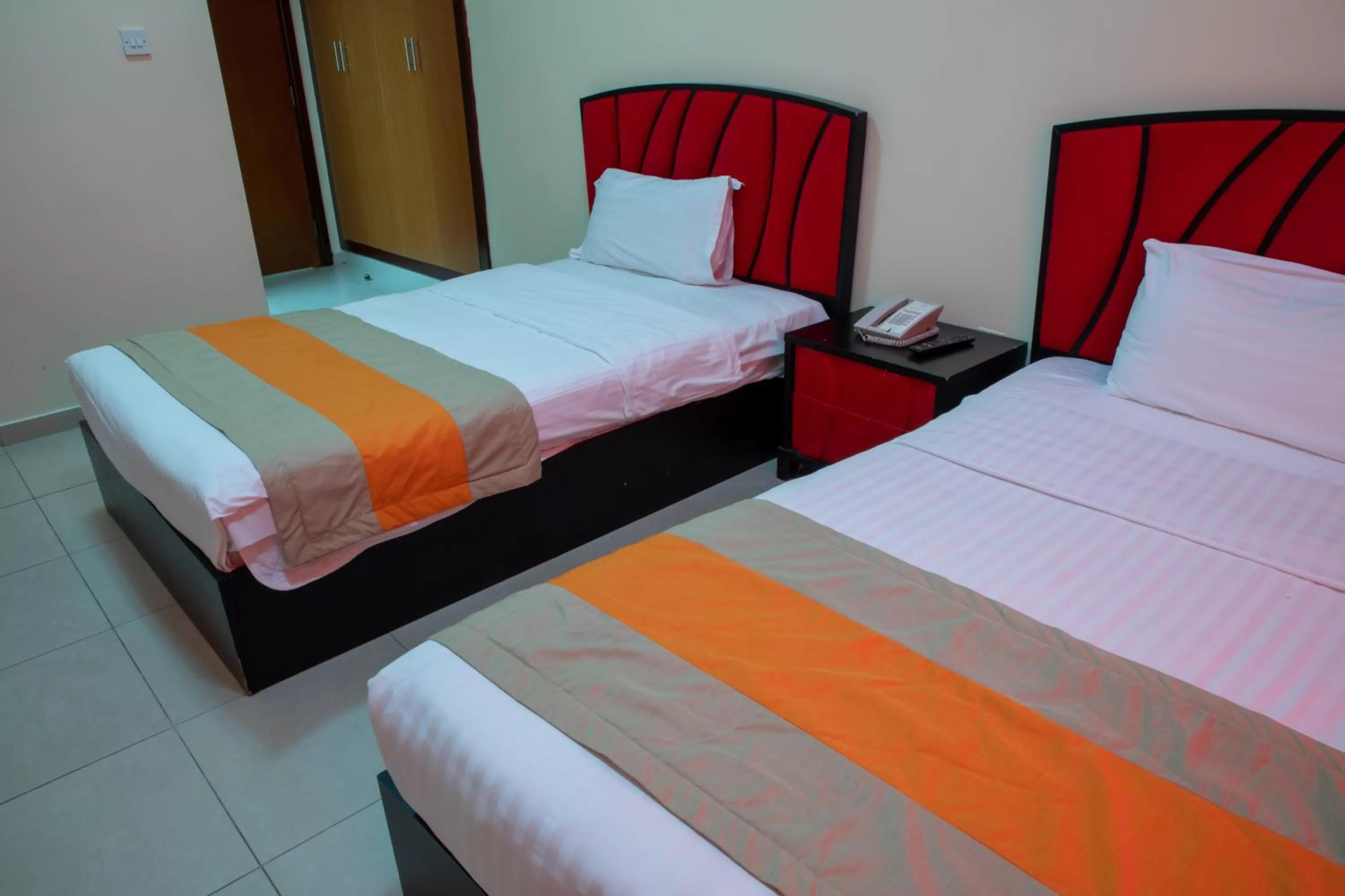 Bed in Wescott Plaza Hotel Apartments LLC Formerly West Zone Plaza Hotel Apts