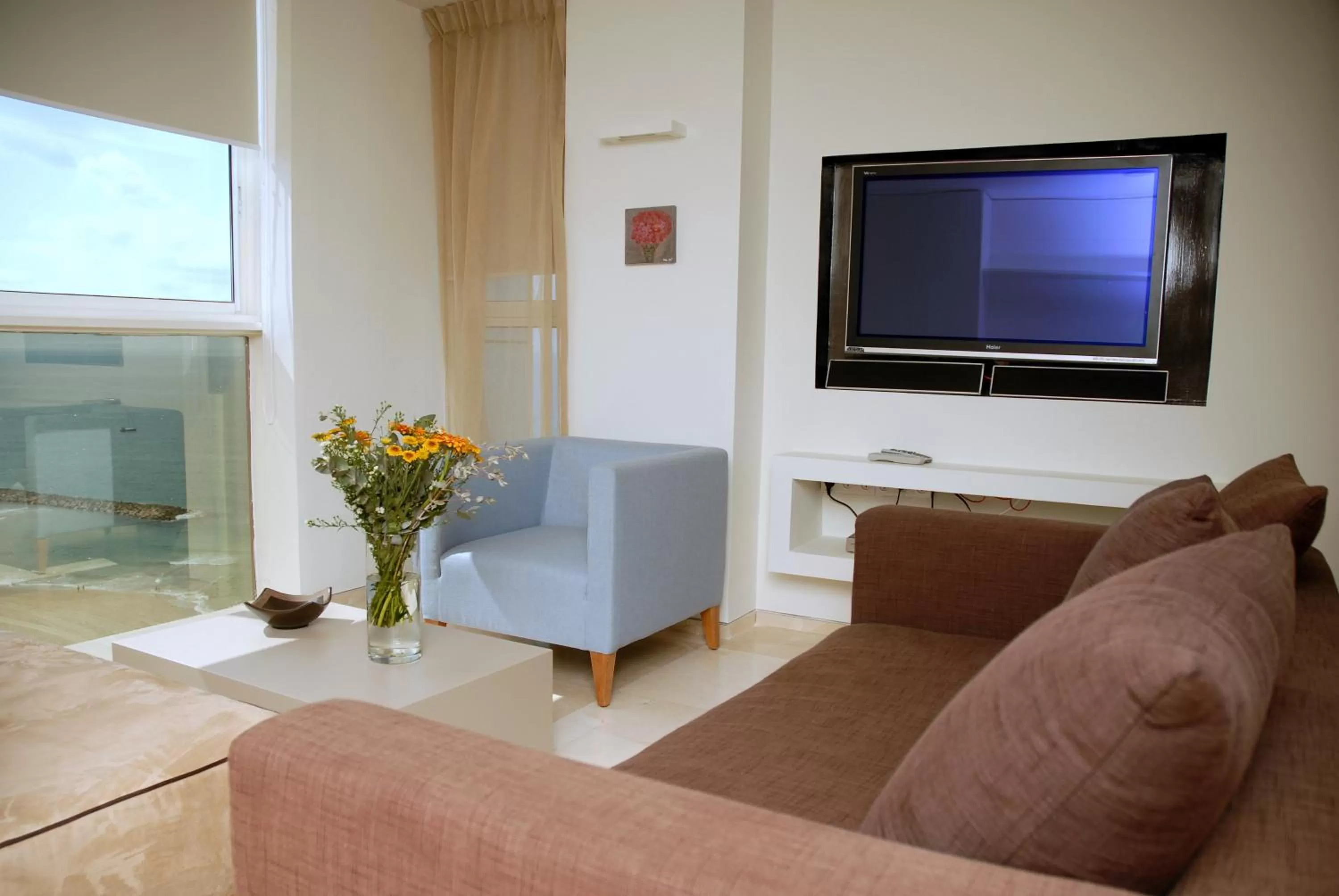 Day, TV/Entertainment Center in Raphael Apartments