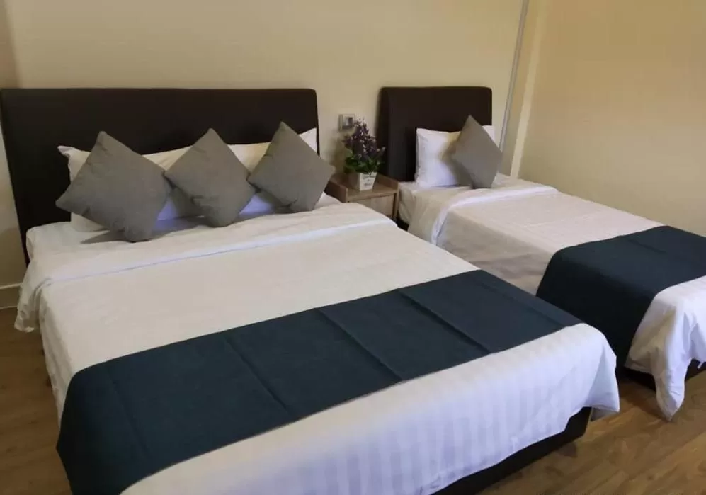 Bed in Star Seasons Hotel