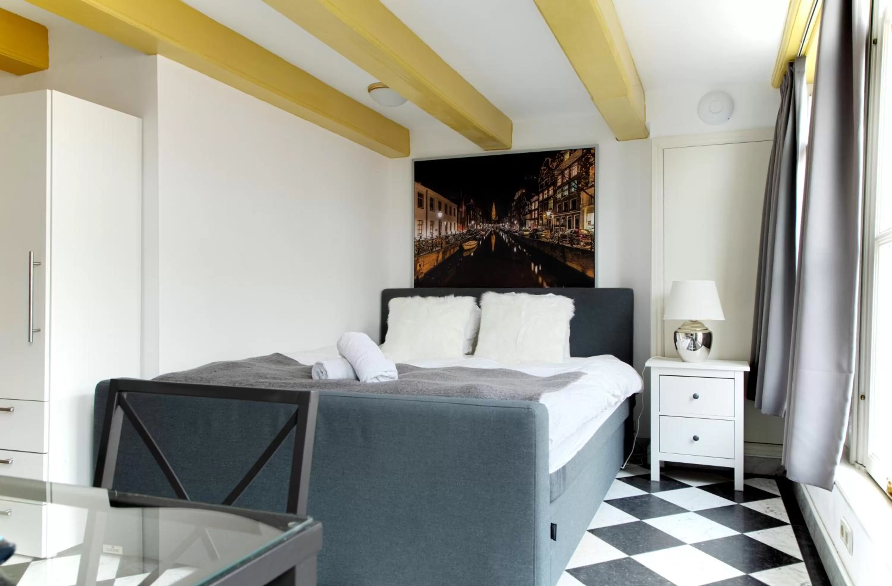 Bed in Modern Canal House Loft - City Center