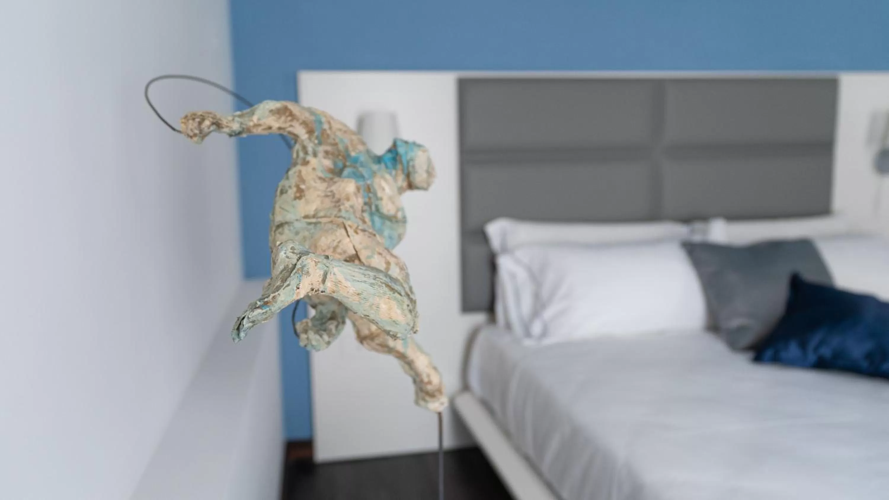 Bed in Palazzo Cappuccini Art Relais