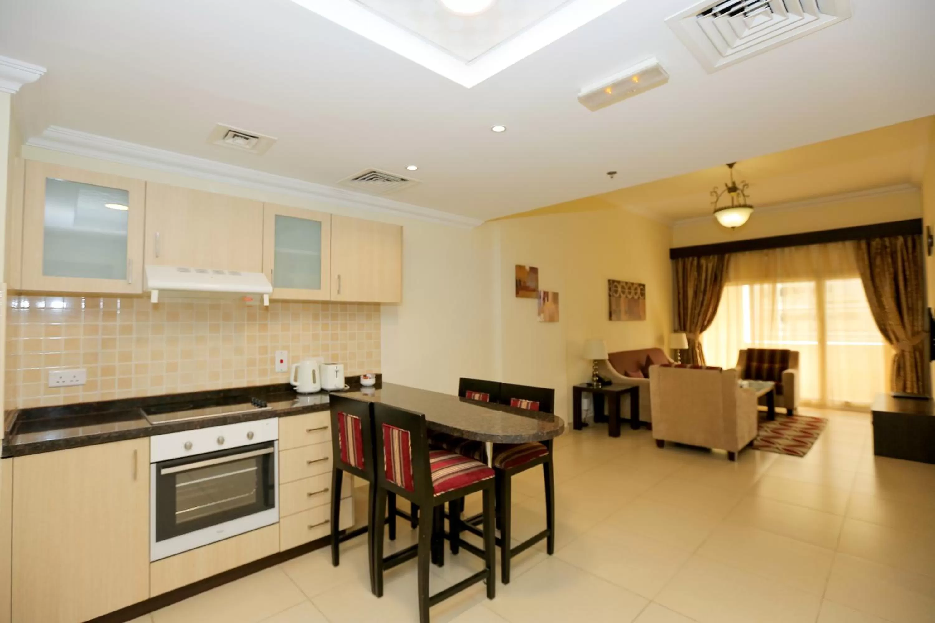 Kitchen or kitchenette in Ivory Grand Hotel Apartments