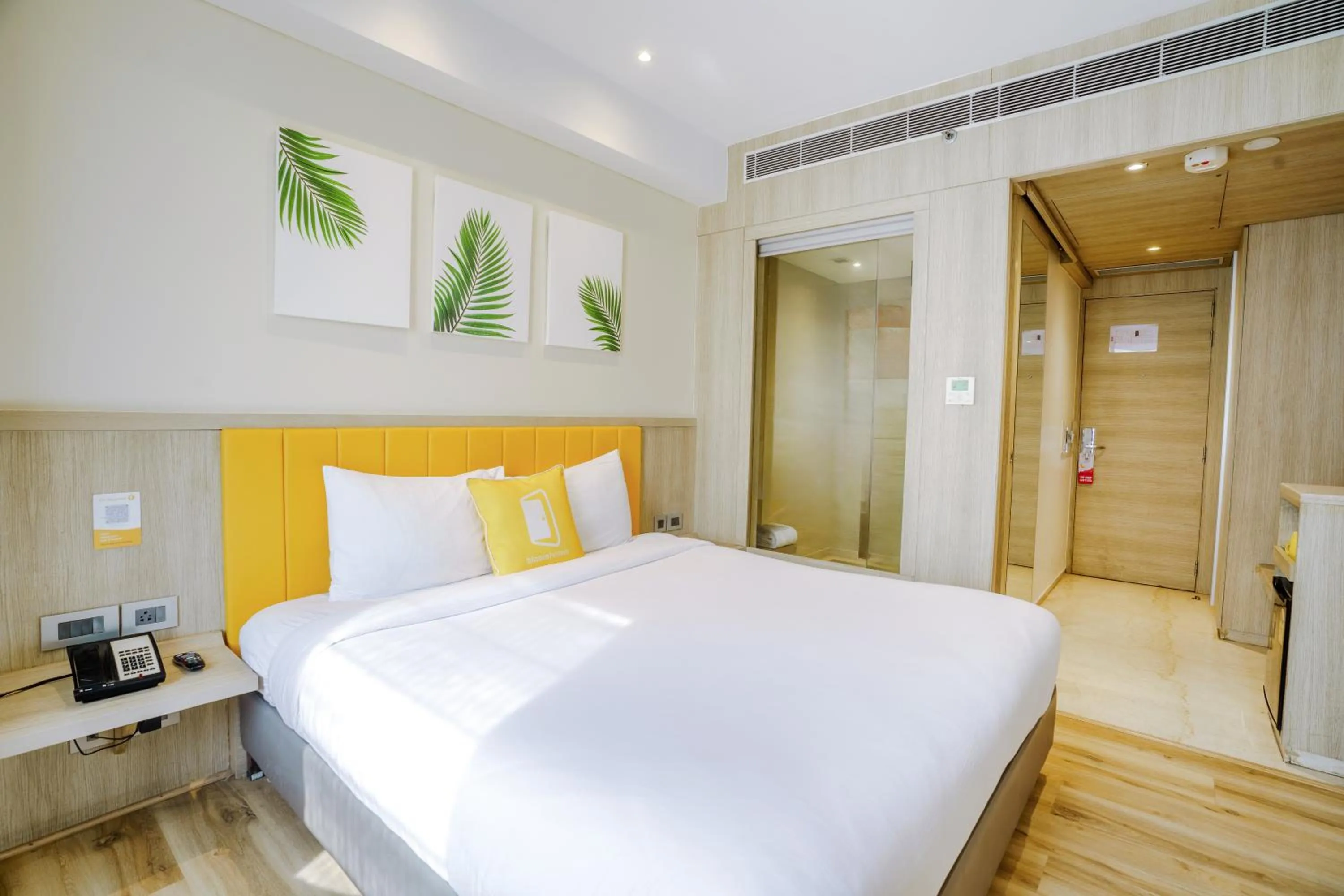 Photo of the whole room, Bed in Bloom Hotel - Karol Bagh