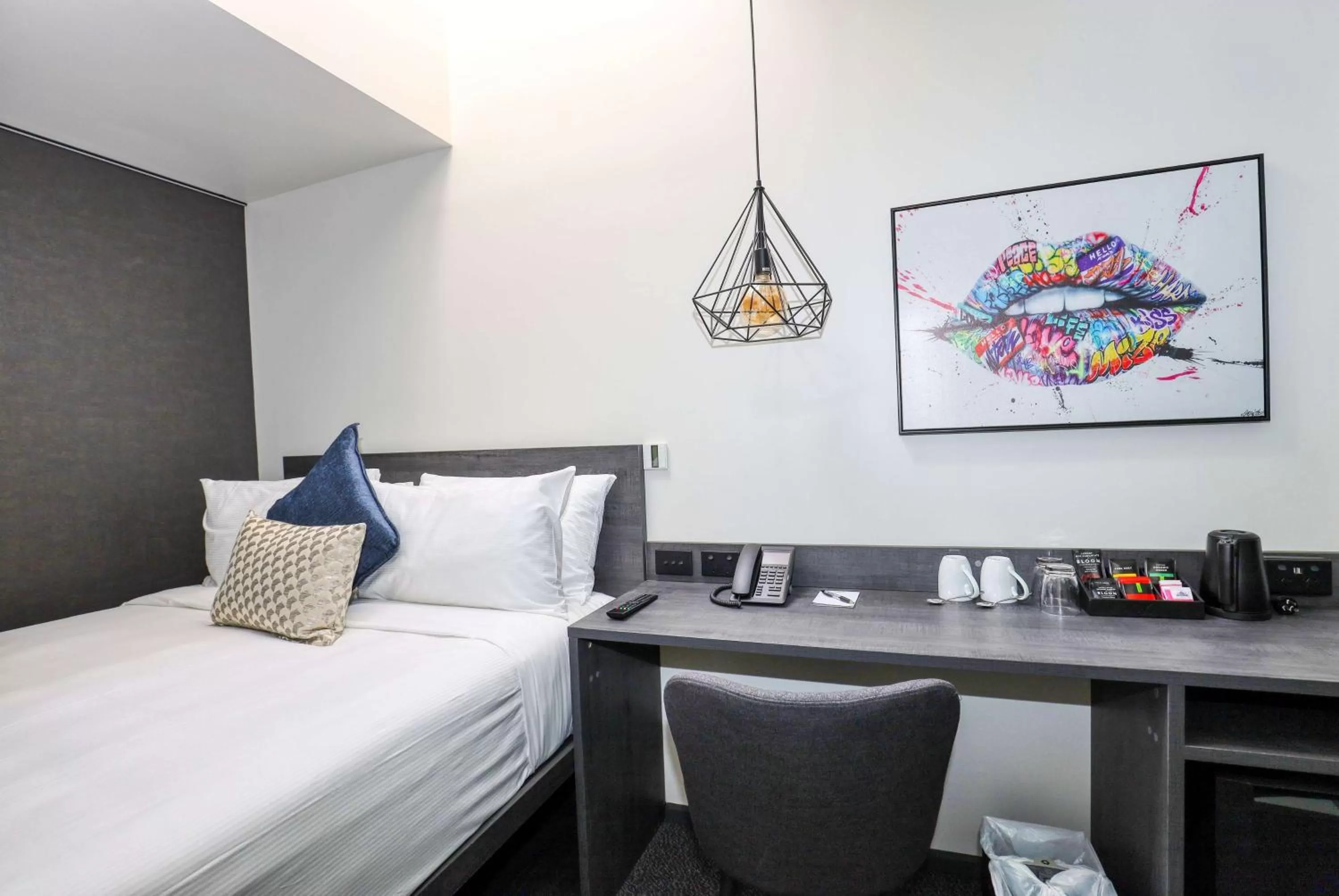 Photo of the whole room, Bed in Microtel by Wyndham Wellington