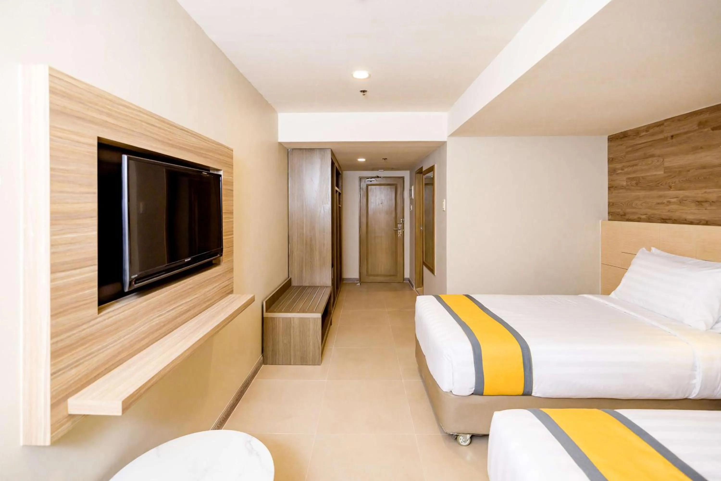 Bedroom, Bed in SureStay Plus by Best Western Cebu City