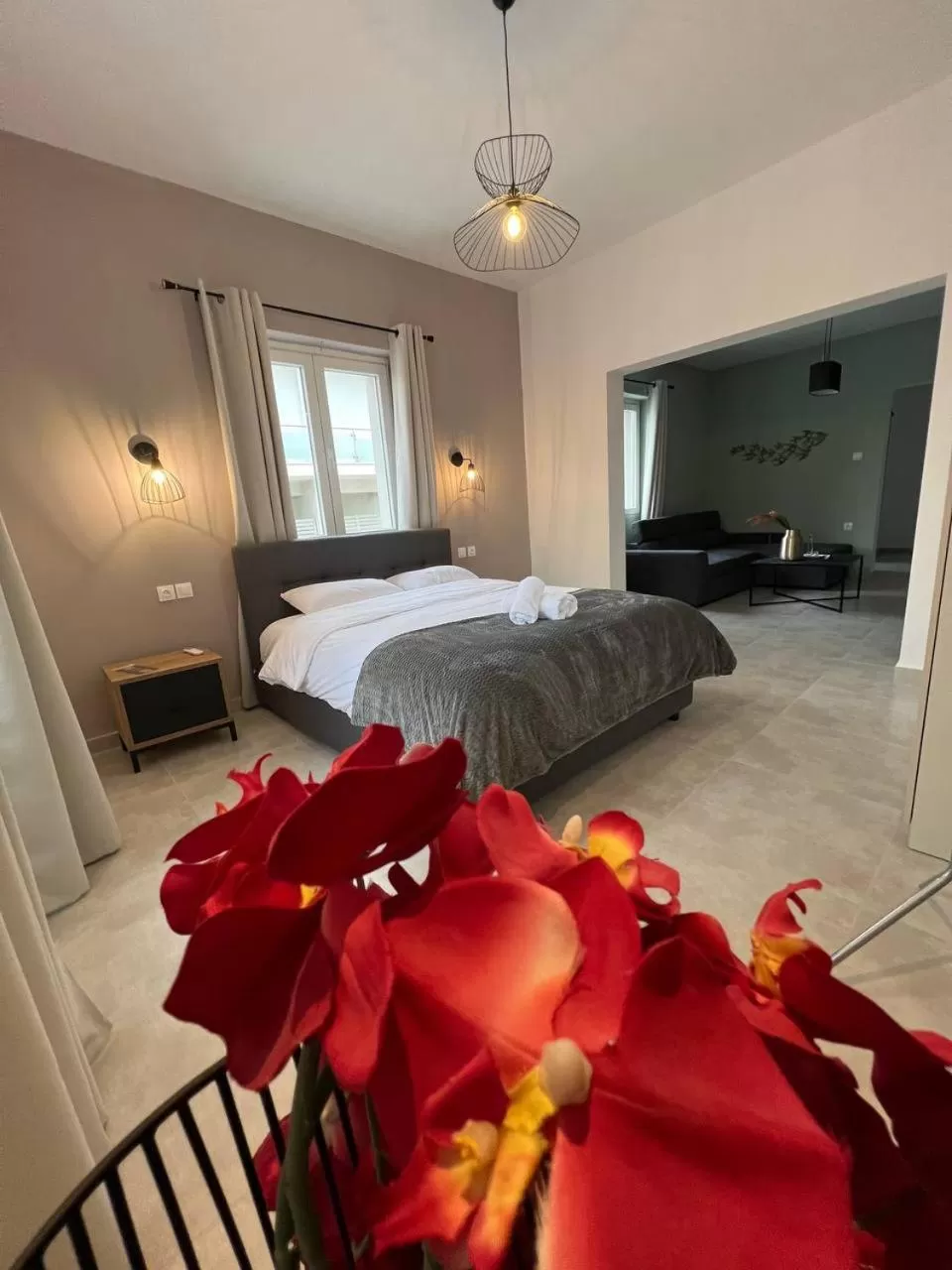 Bed in Elefsinian Mysteries Apartments