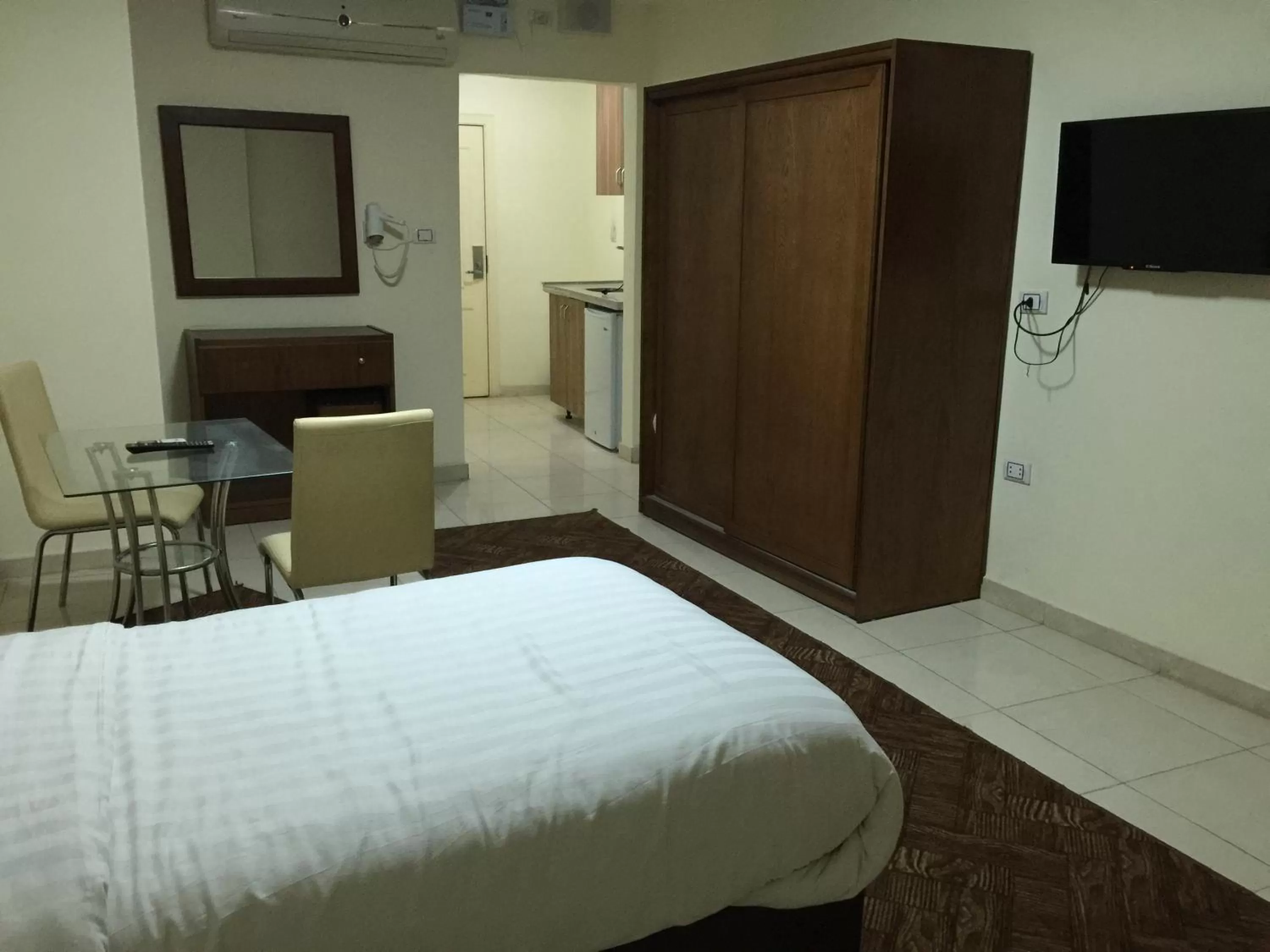 Bed in Zaina Plaza Hotel