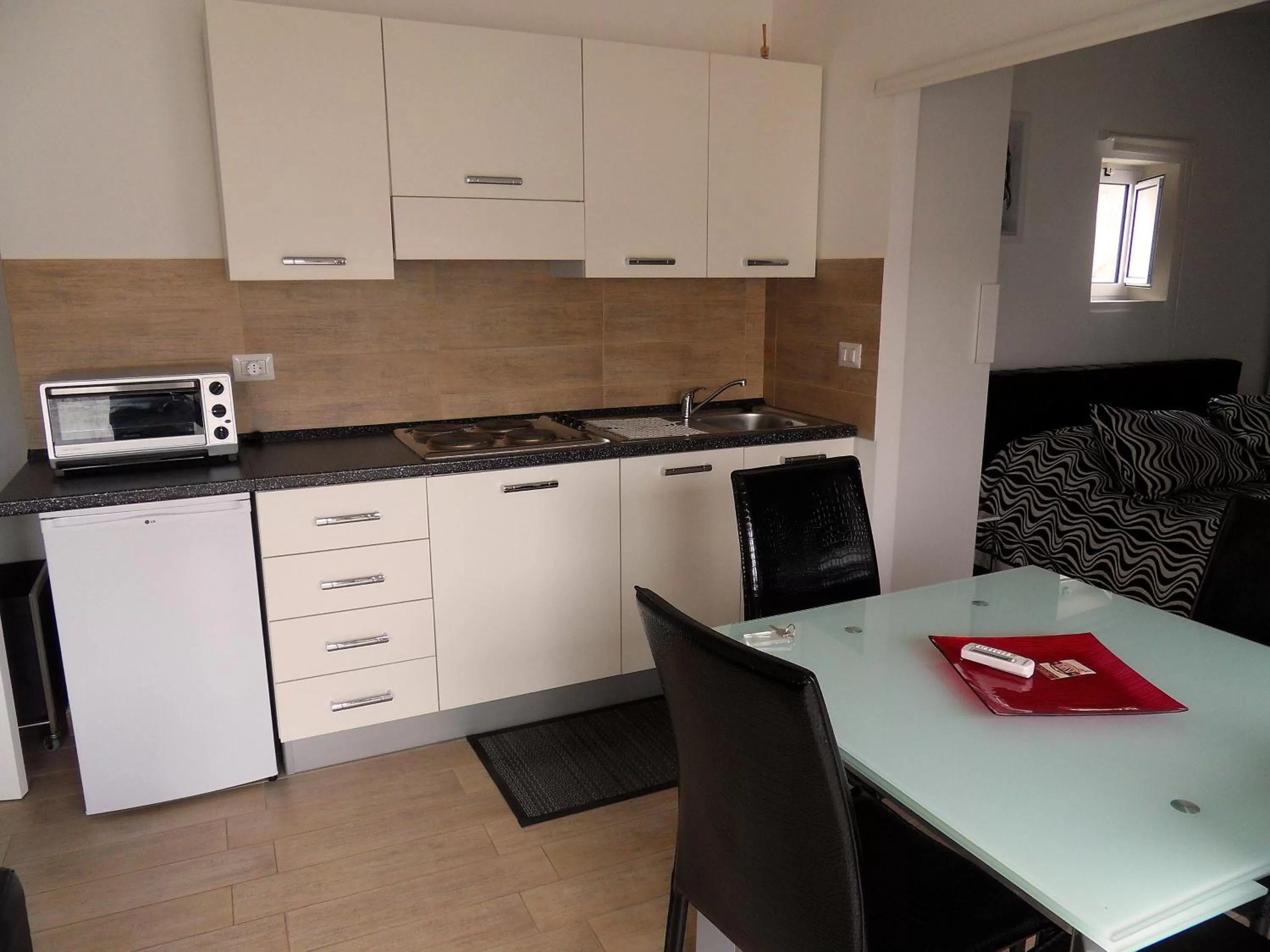 Kitchen or kitchenette in Albergo Diffuso Dimora Rossi B&B