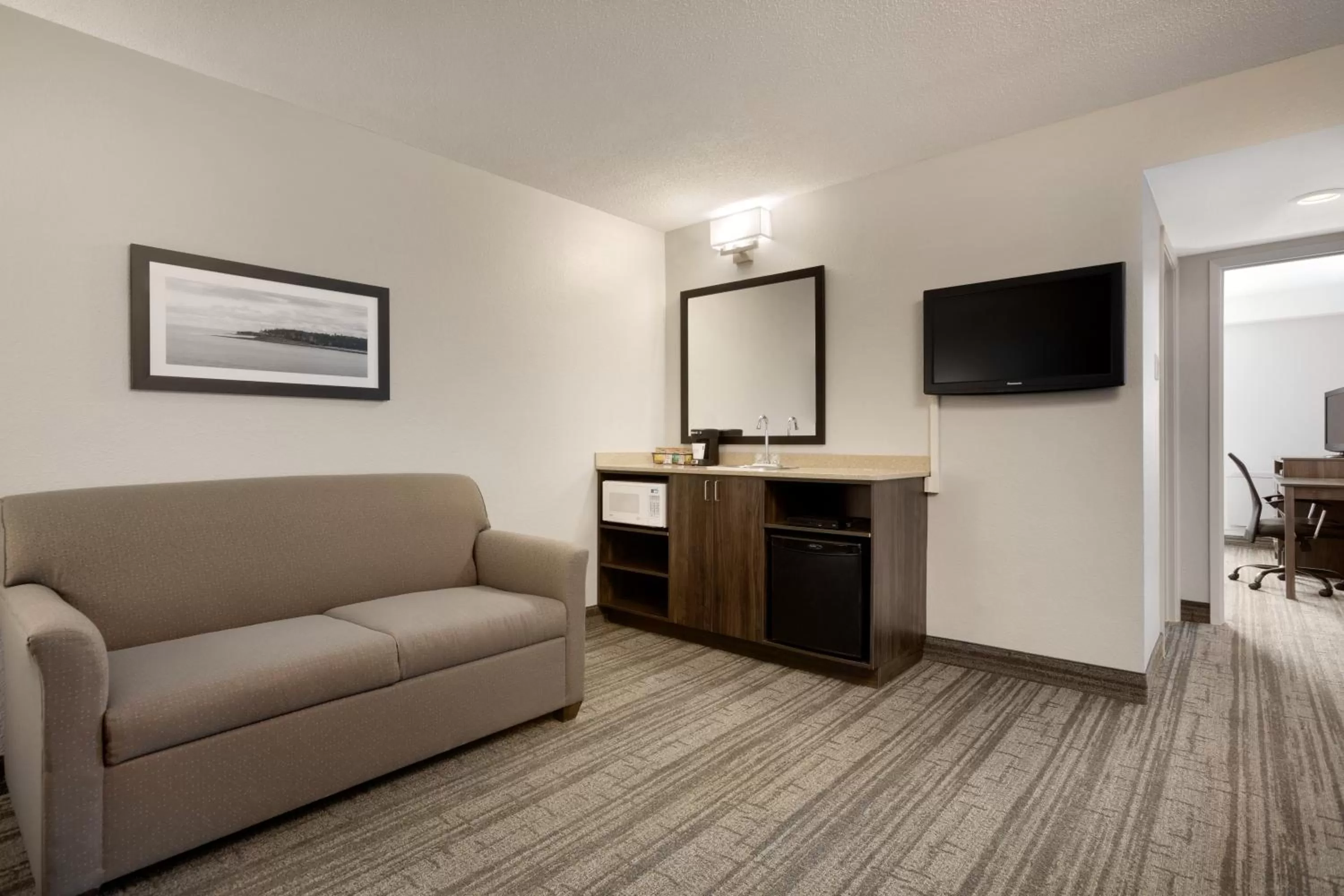 Living room in Travelodge Suites by Wyndham New Glasgow