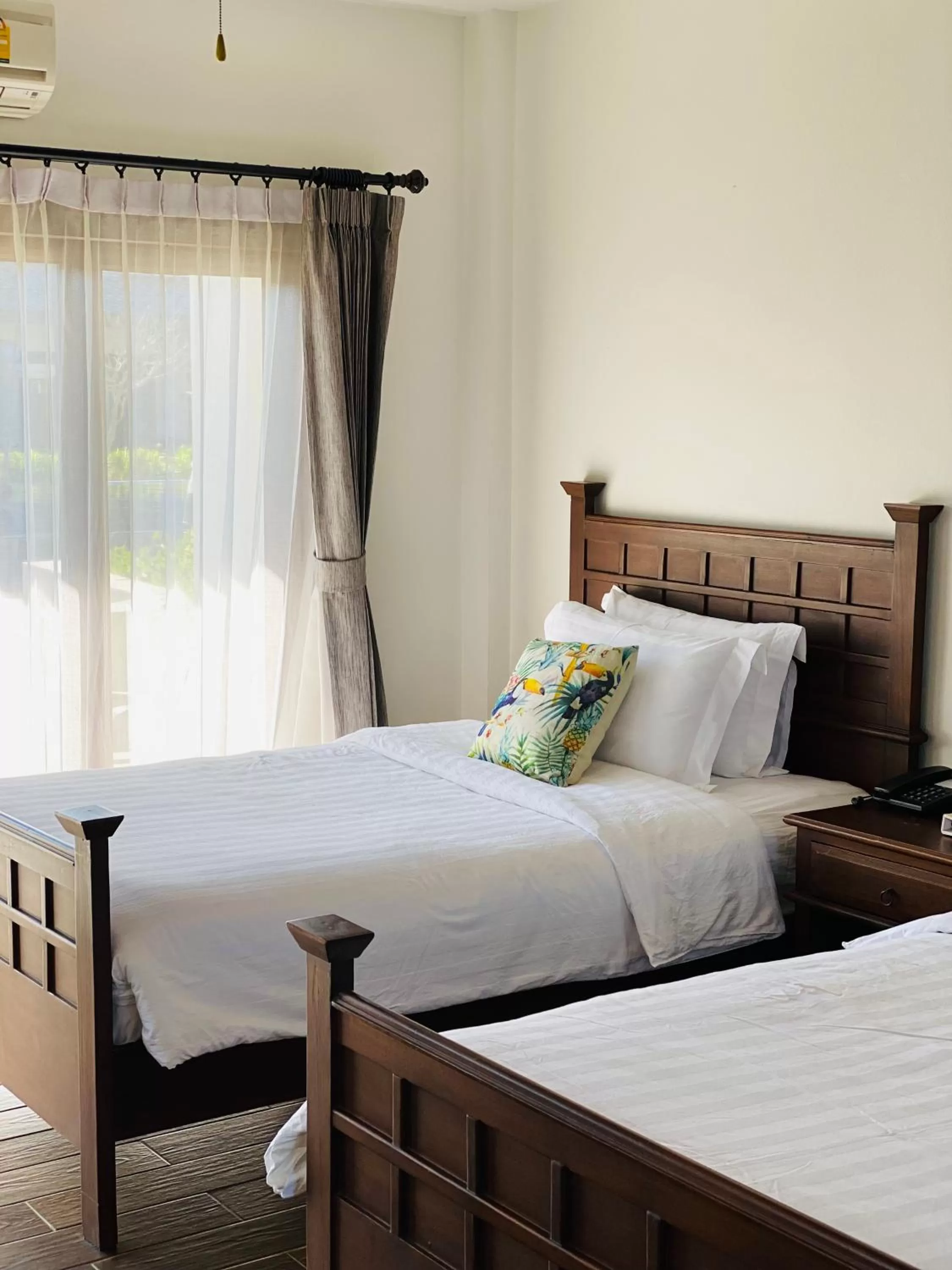 Bed in Lanna Deer Resort Chiang Mai