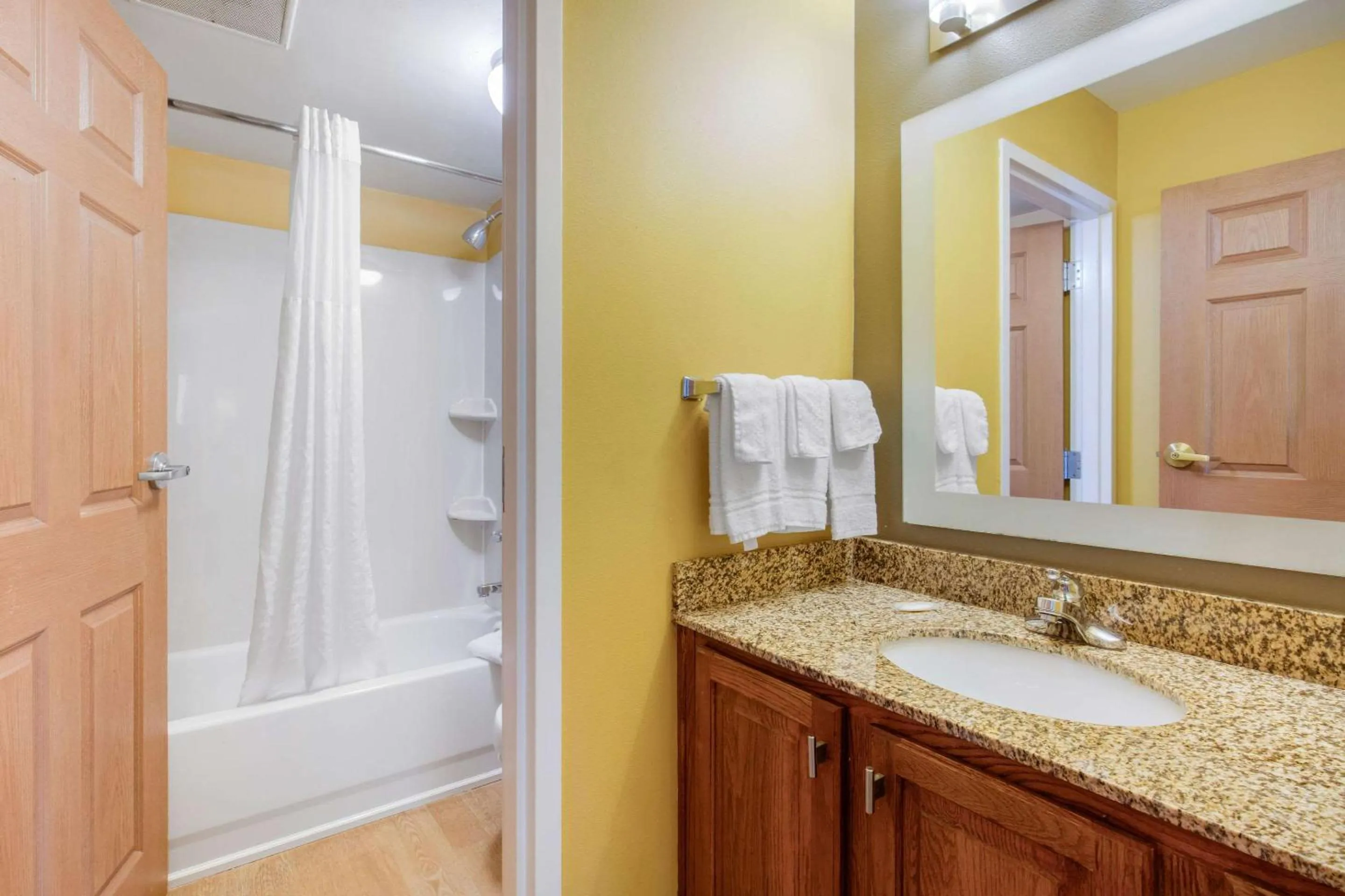 Bedroom in Suburban Studios Birmingham Homewood I-65