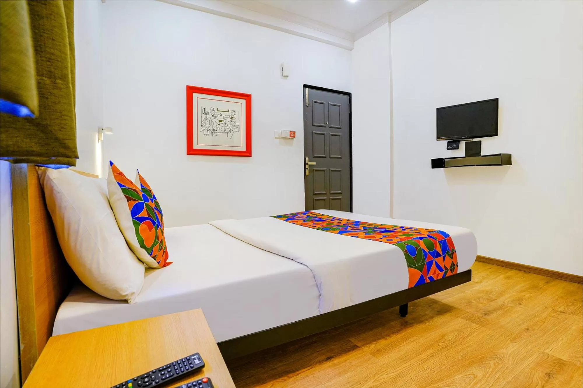 Communal lounge/ TV room, Bed in FabExpress Highway Residency