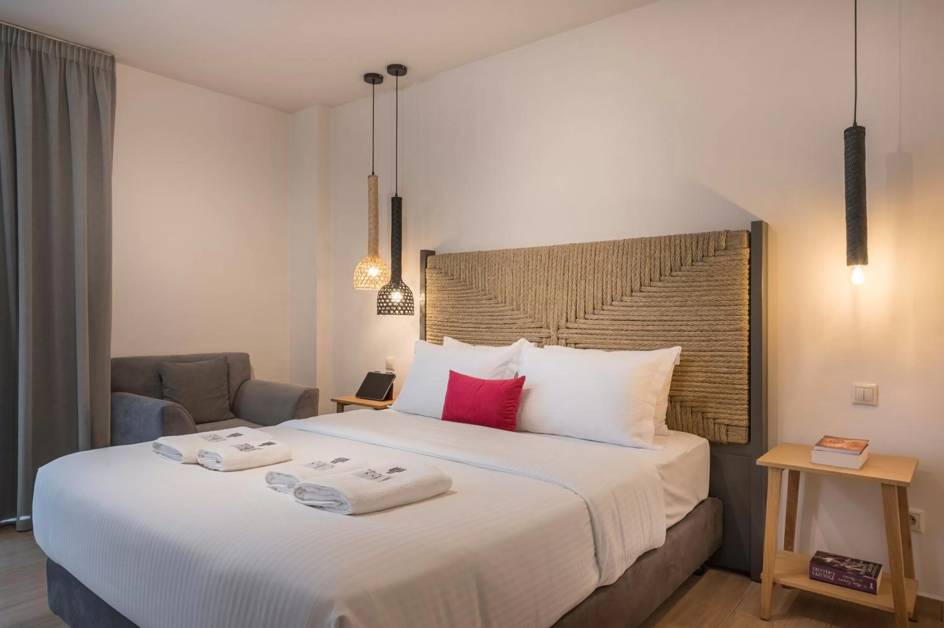 Bed in Trianon Luxury Apartments & Suites