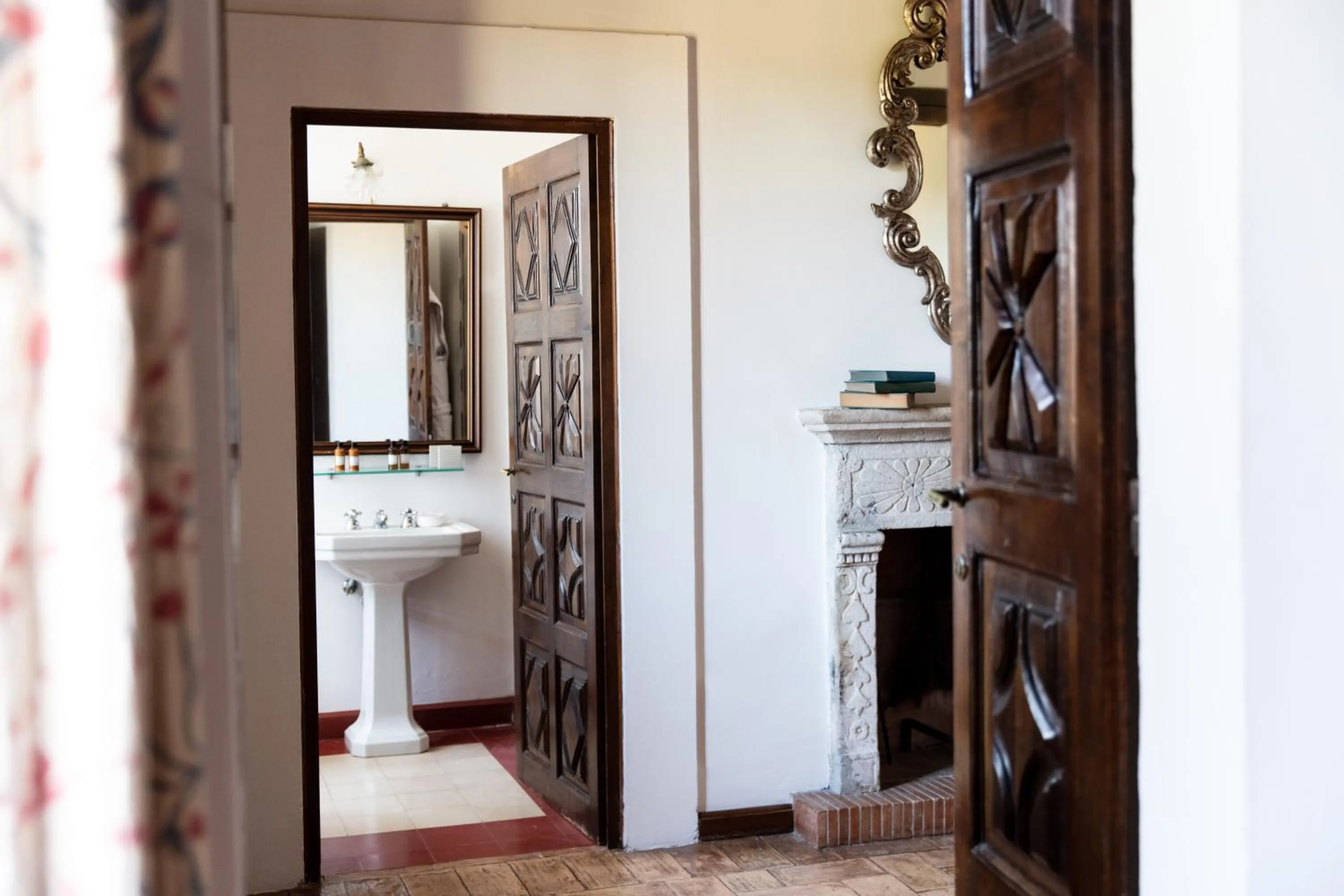 Bathroom in La Posta Vecchia Hotel