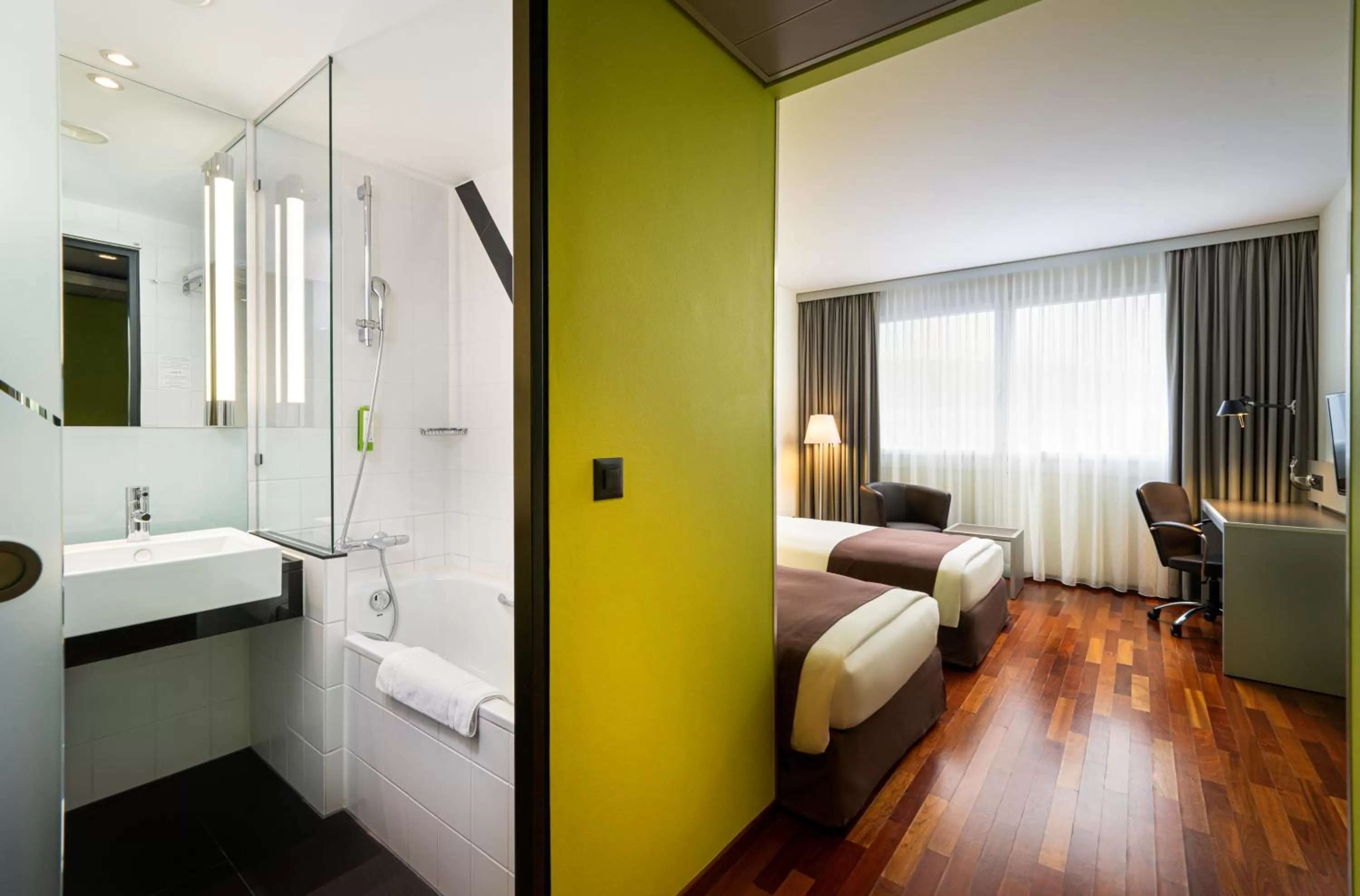 Bathroom, Bed in Holiday Inn Zürich Messe by IHG