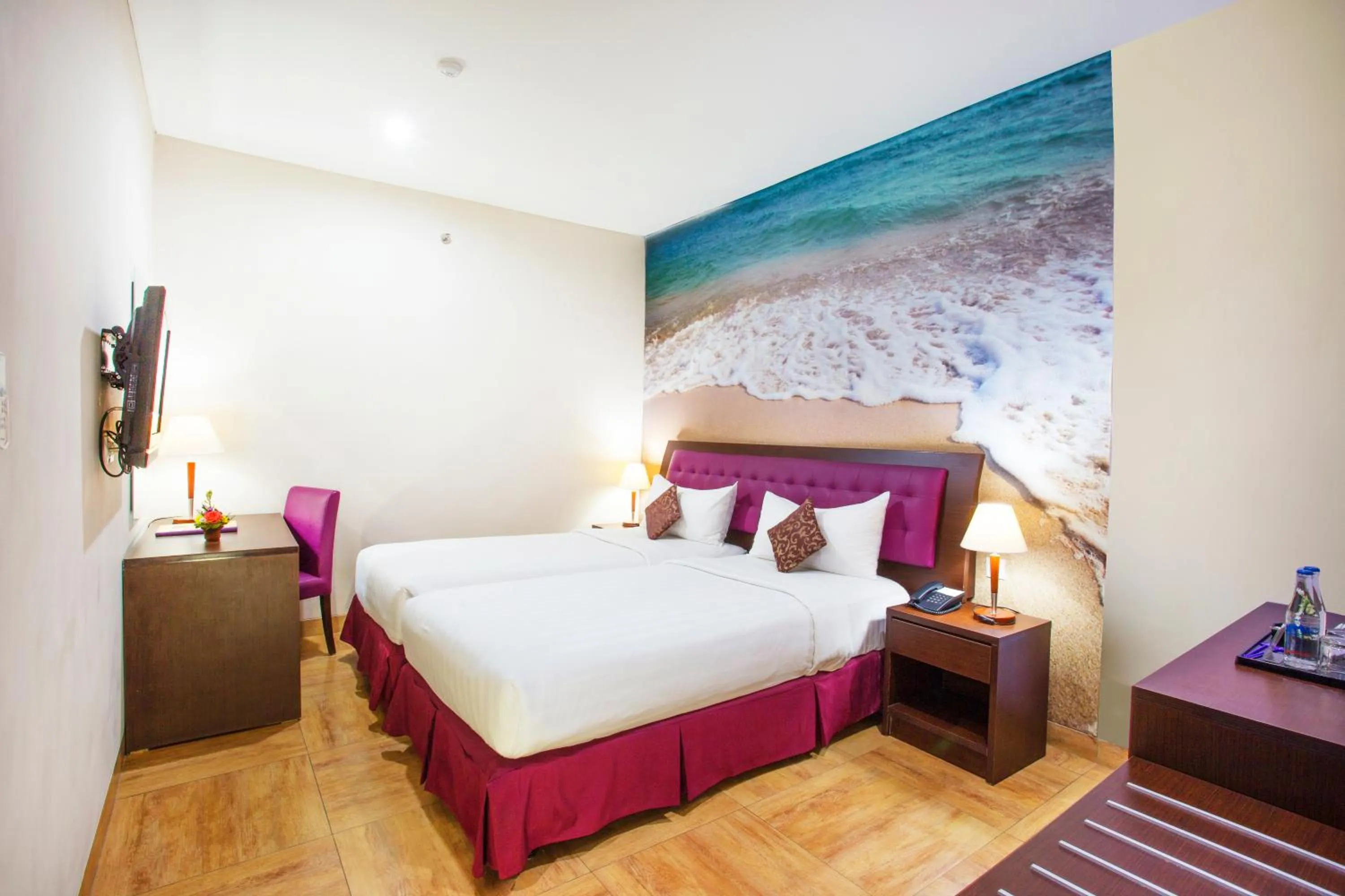 Bed in Kuta Central Park Hotel