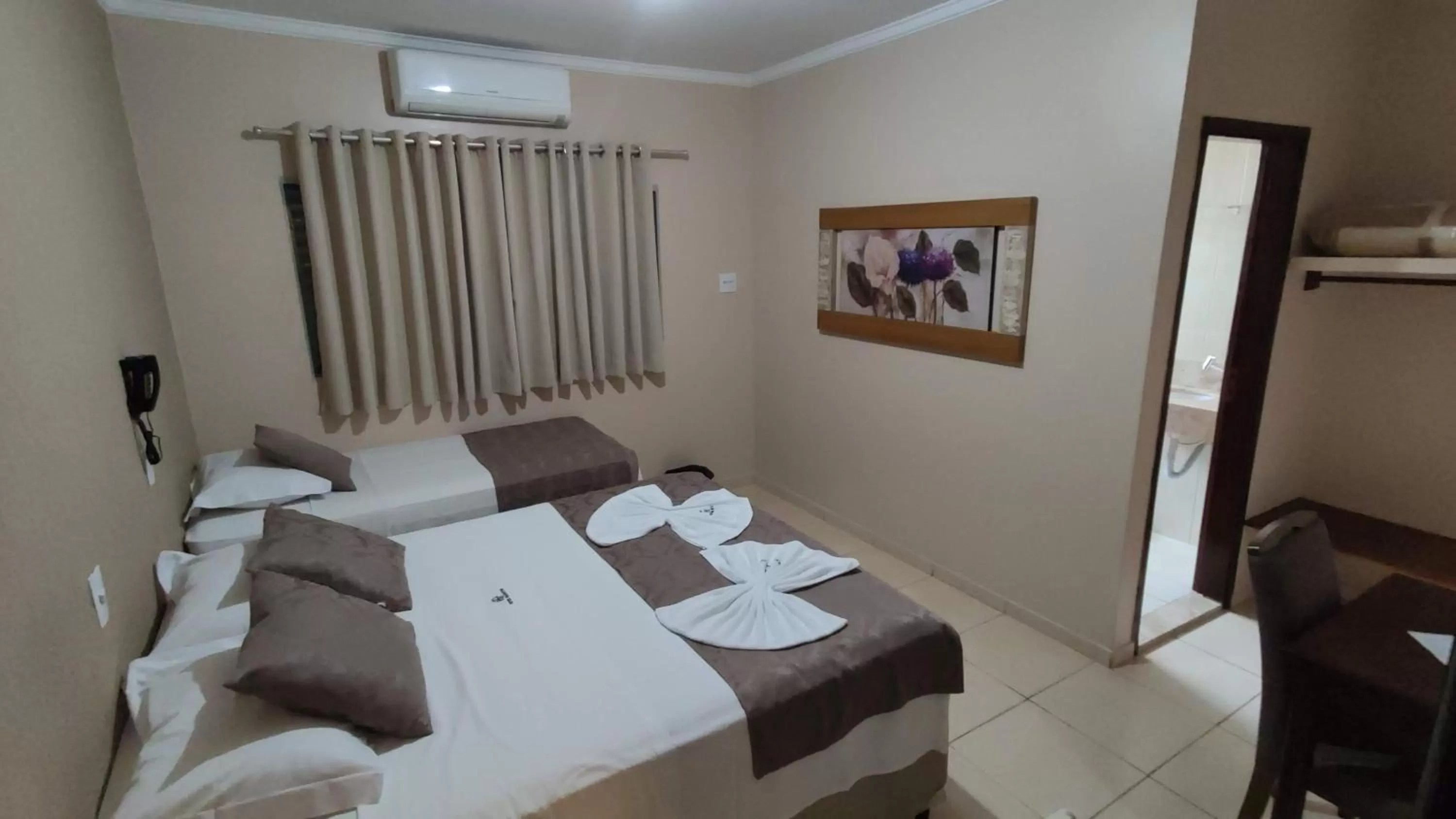 Bed in Hotel Barretos