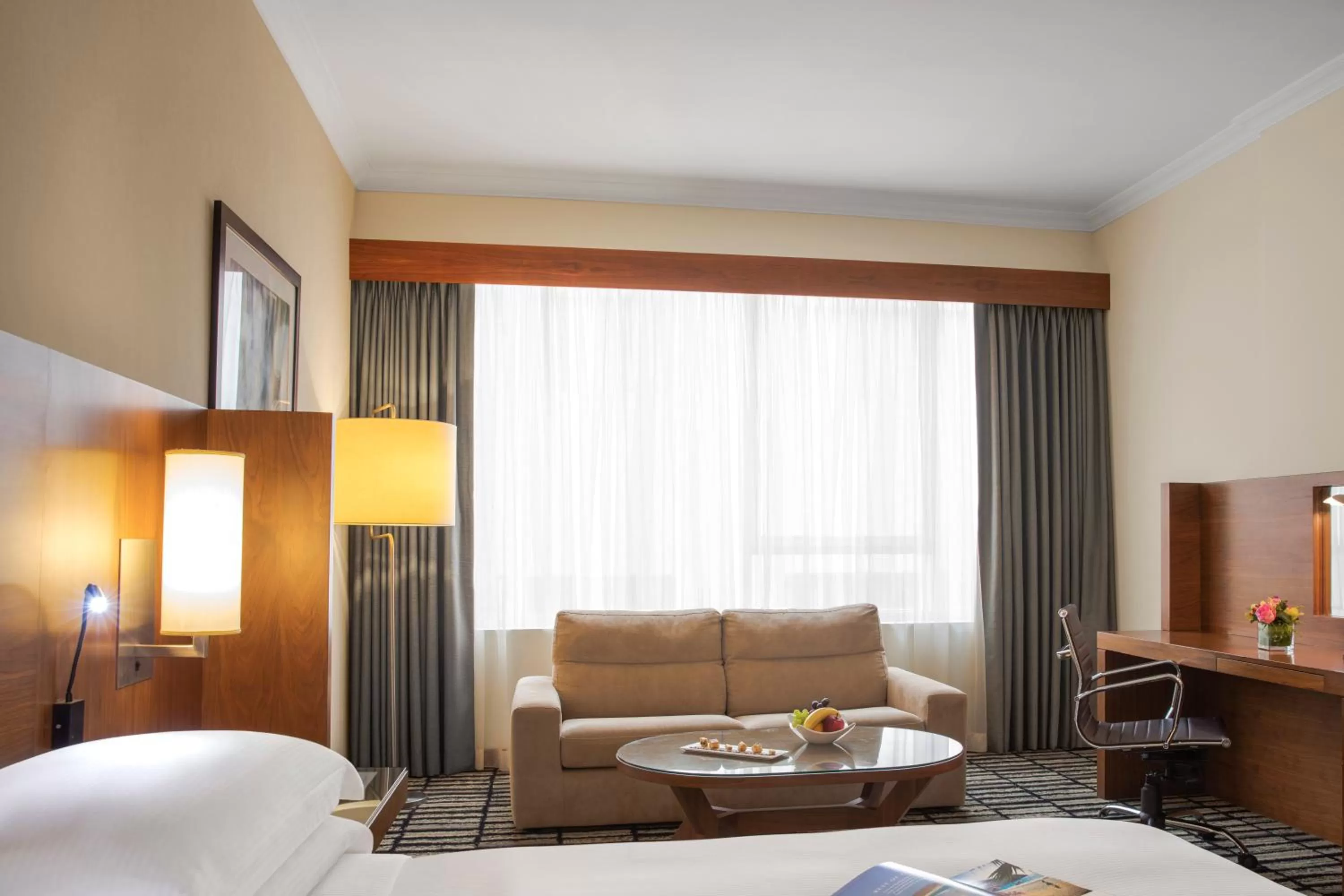 Seating area, Bed in Jumeira Rotana – Dubai