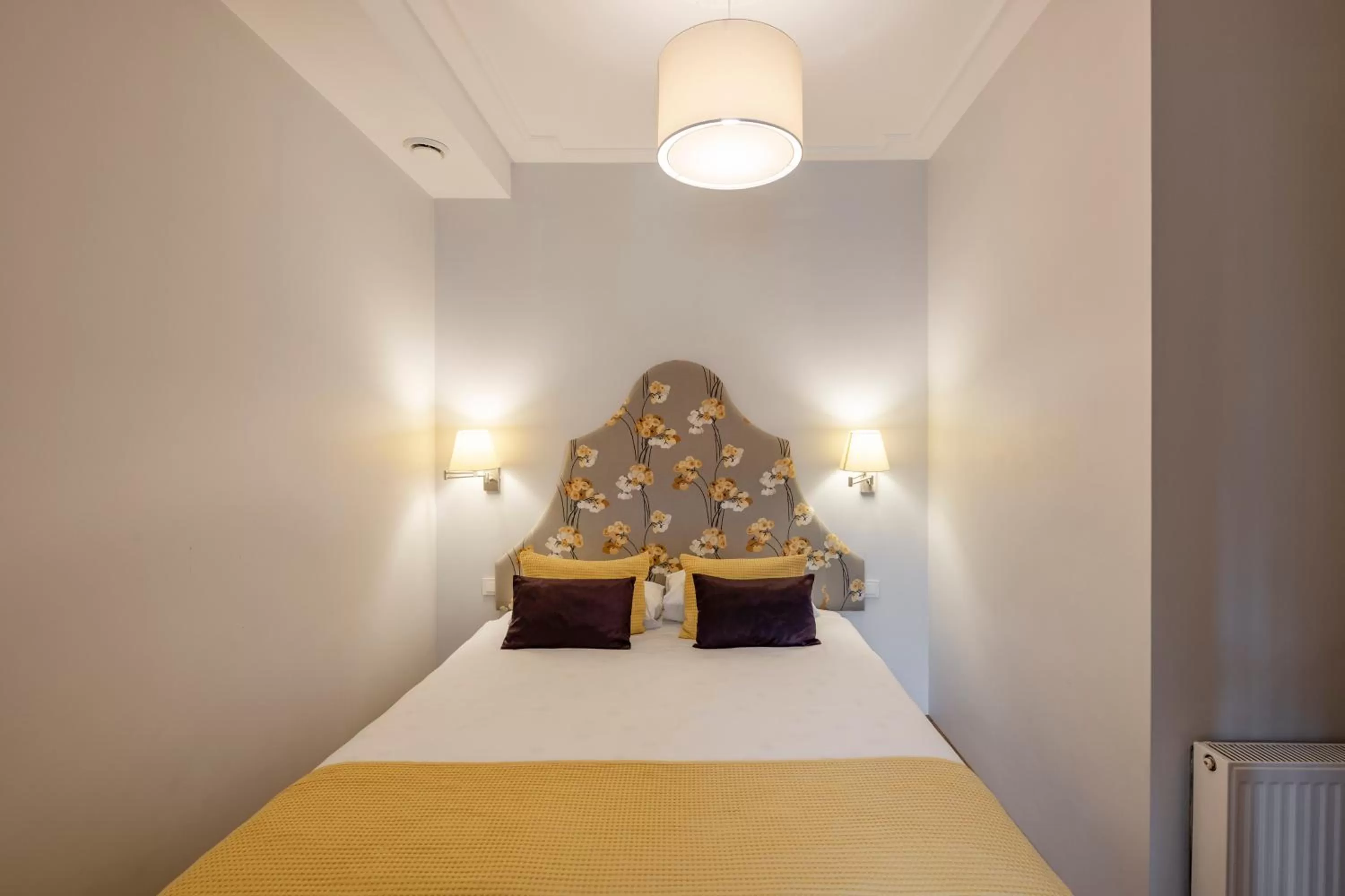 Bed in Vilnius Apartments