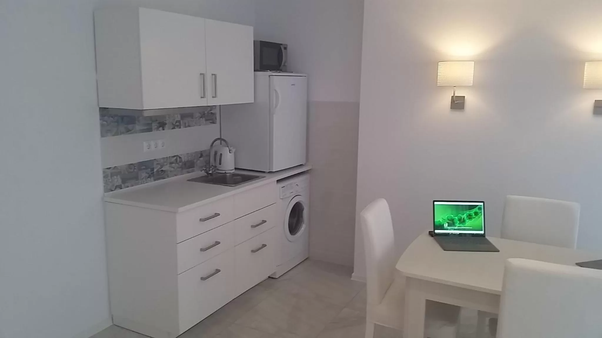 TV and multimedia, Kitchen/Kitchenette in PURE WELLNESS SEA-VIEW Beluga & Dolphin Luxury HOTEL apartments