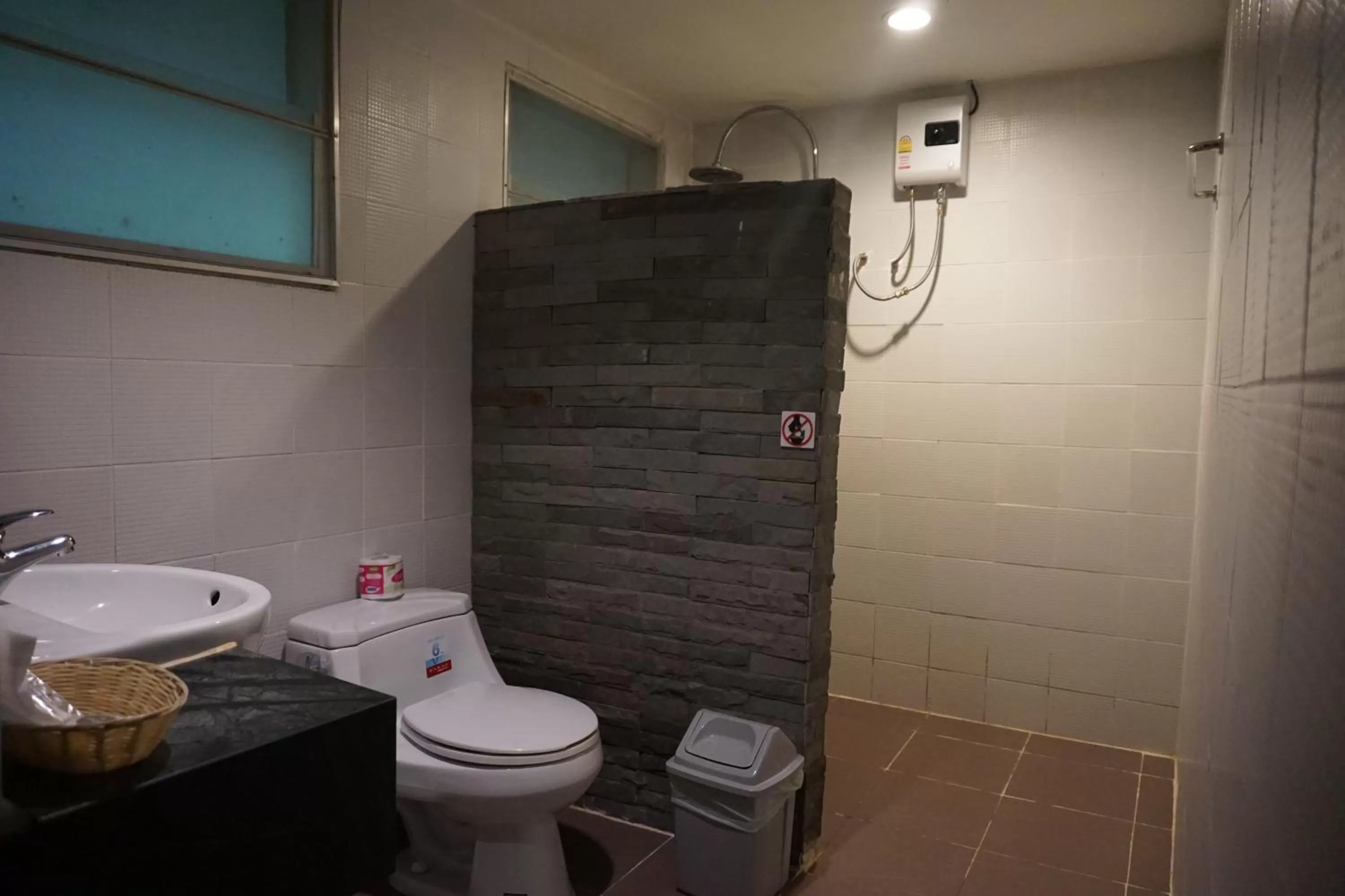 Toilet, Bathroom in Rock and Tree House Resort