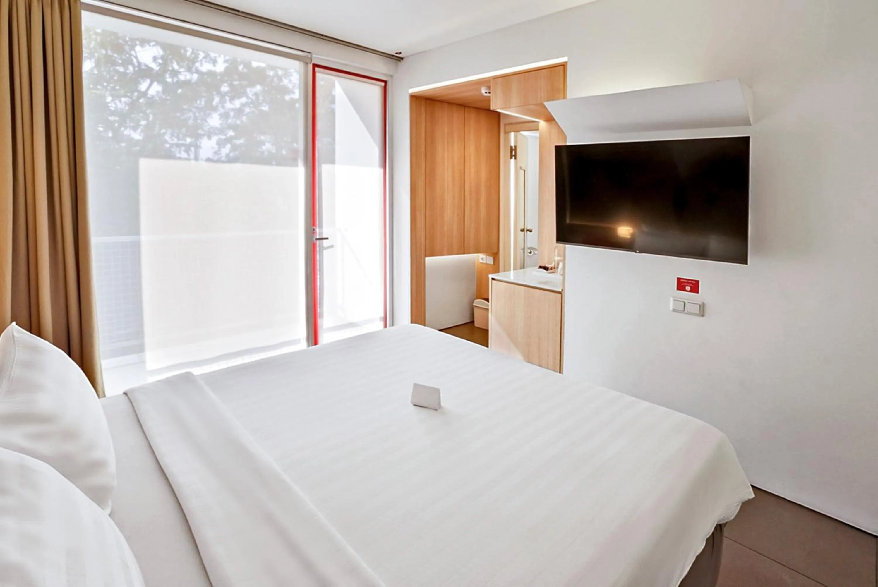 Bed in Malaka Hotel Bandung