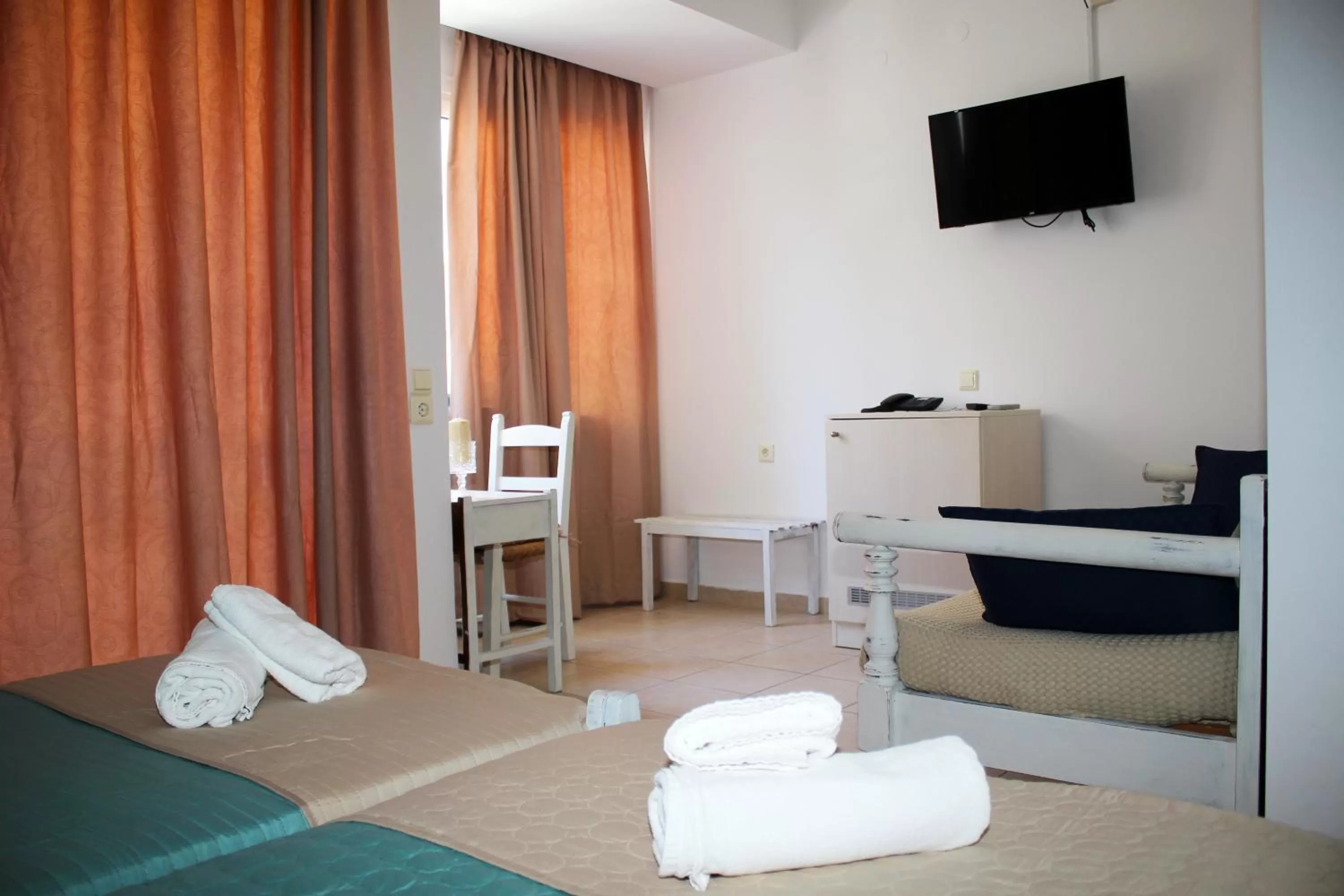 Bed in Ikaros Art Hotel