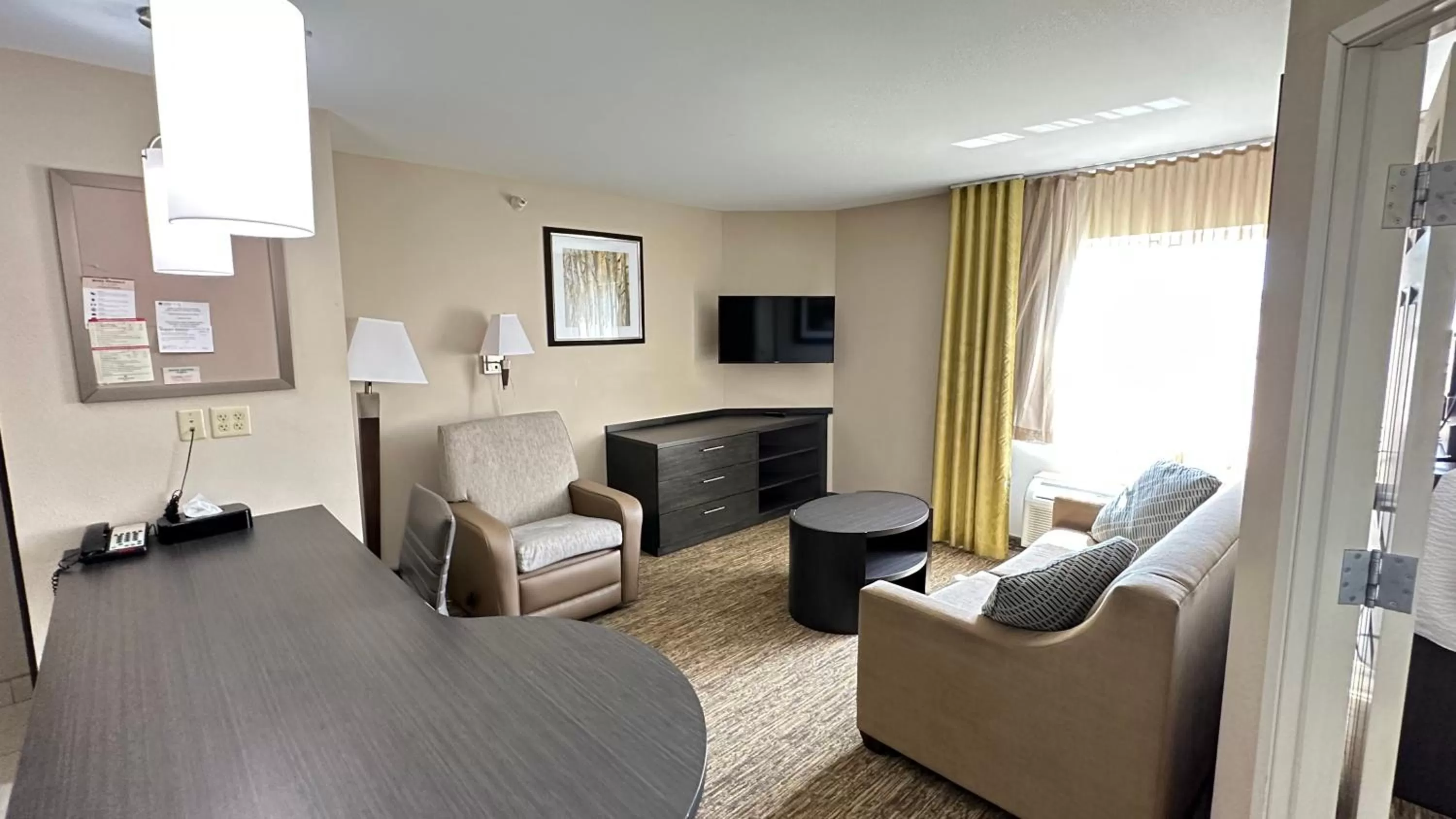 Living room in Candlewood Suites South Bend Airport by IHG