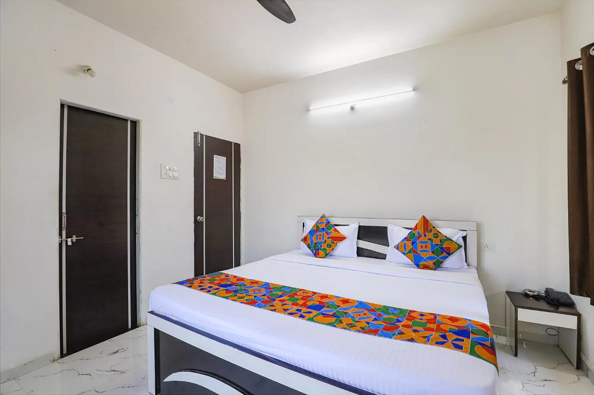 Bed in FabHotel Elite Palm