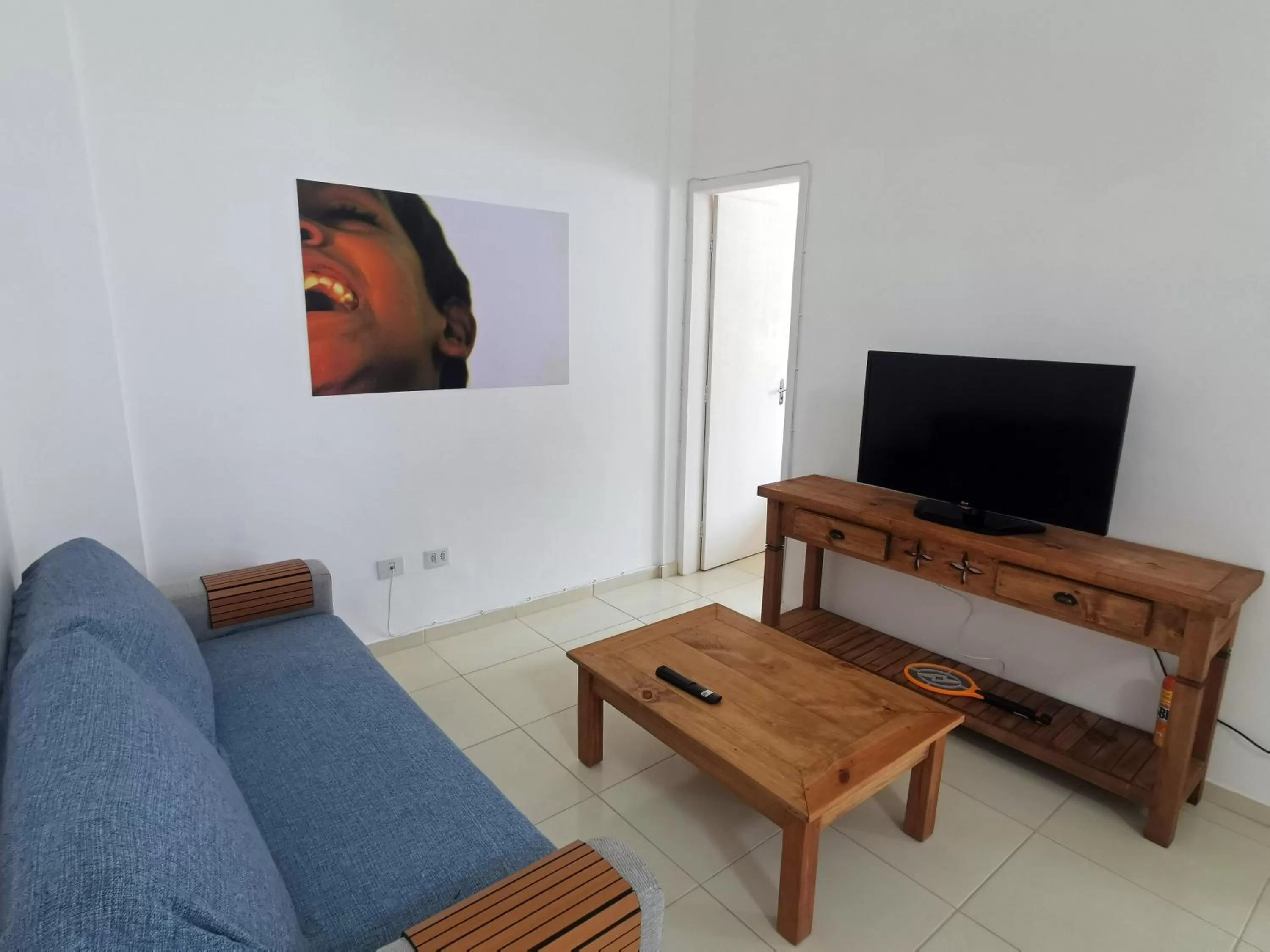 Living room, TV/Entertainment Center in Manga Verde Beach Residence