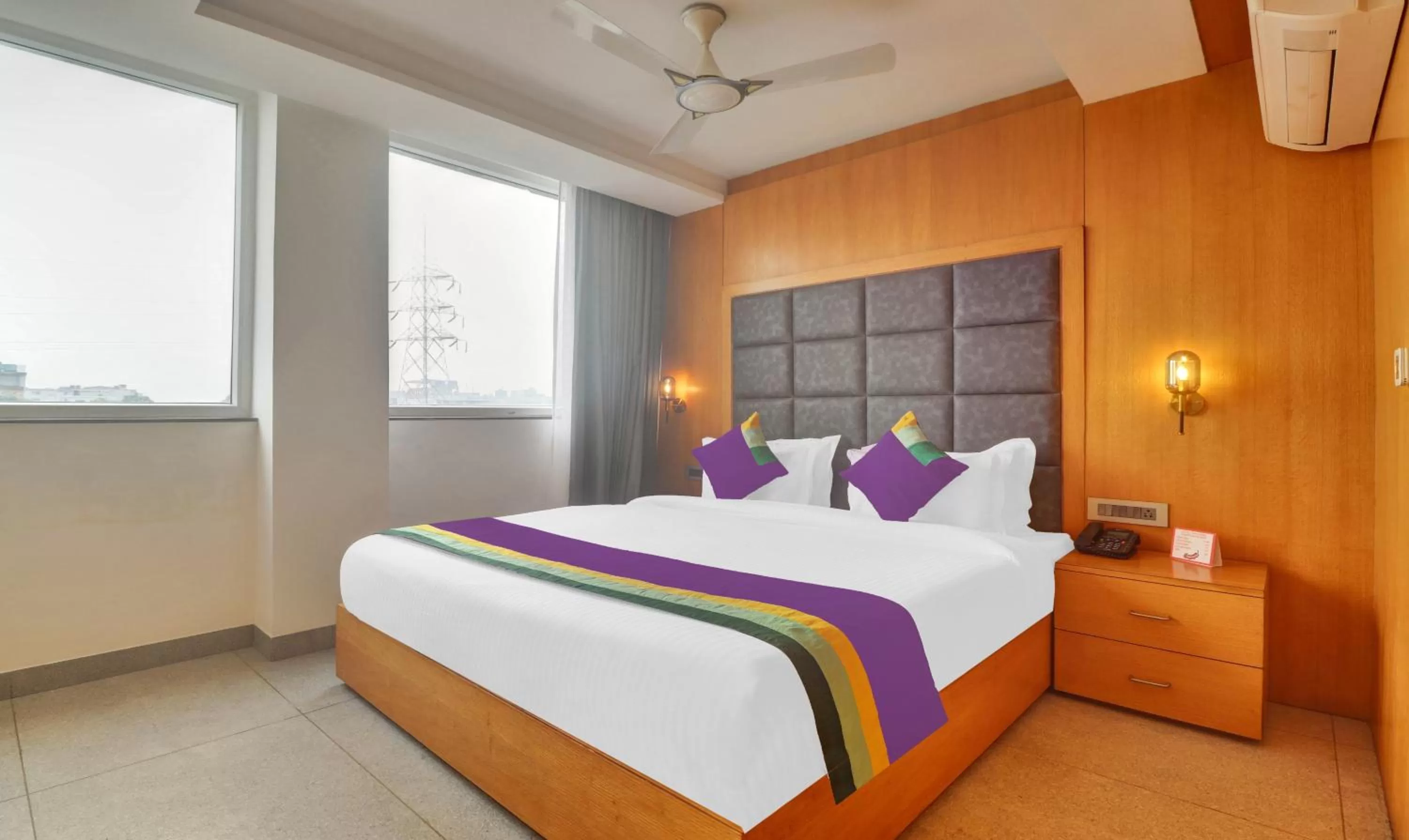 Bedroom, Bed in Treebo Tryst Tamarind