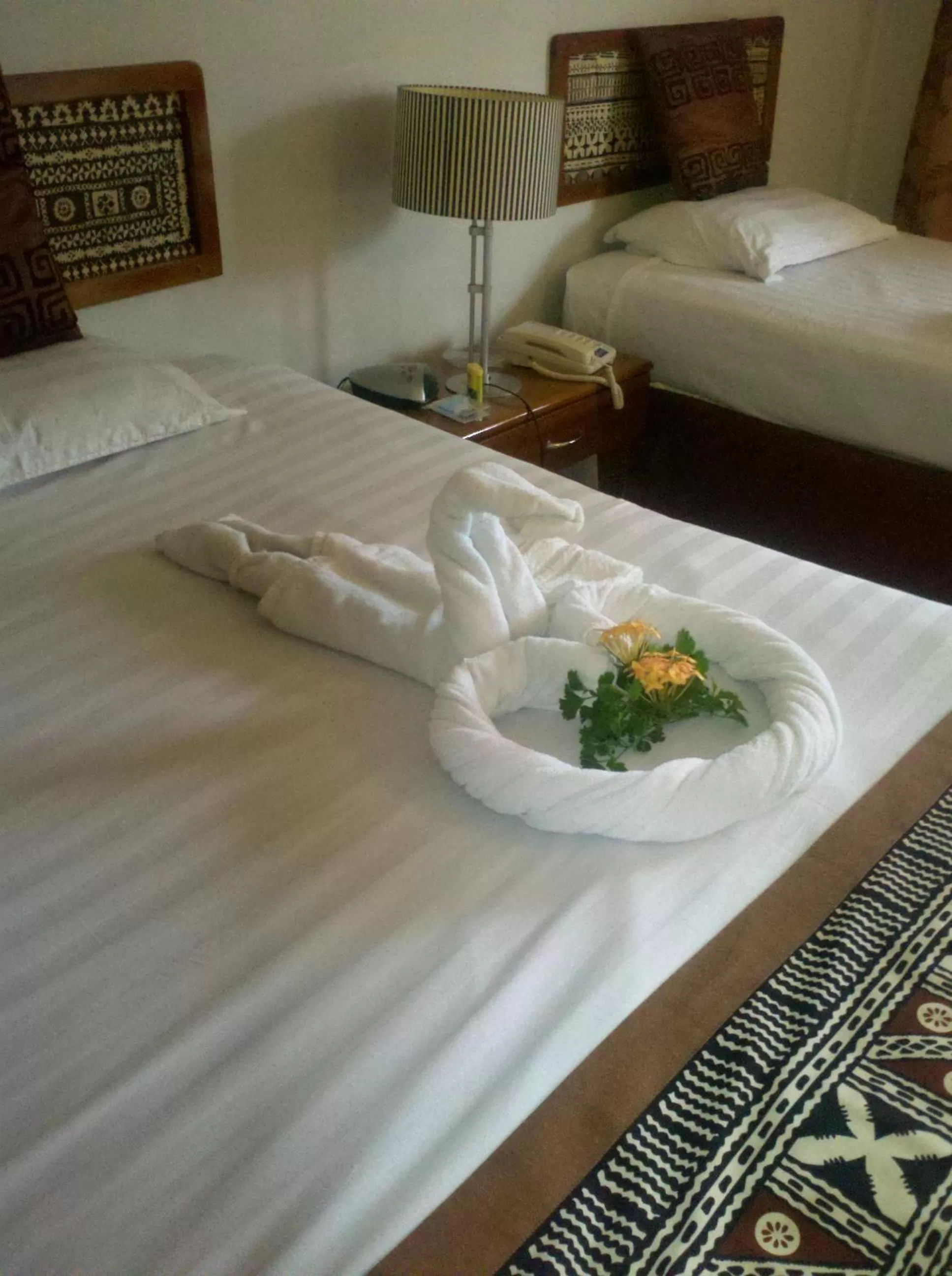 Bed in Capricorn International Hotel