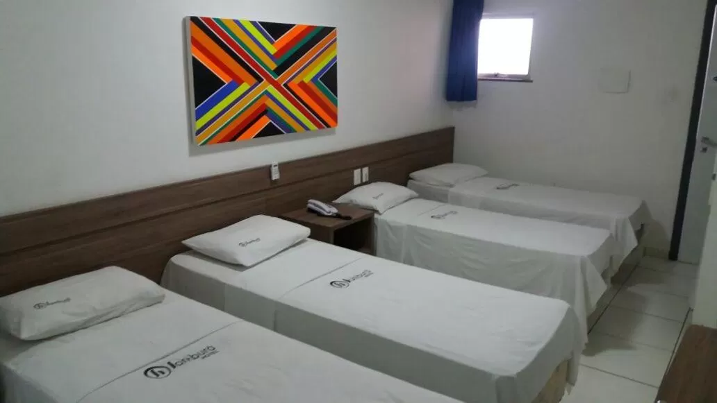 Bed in Sambura Hotel