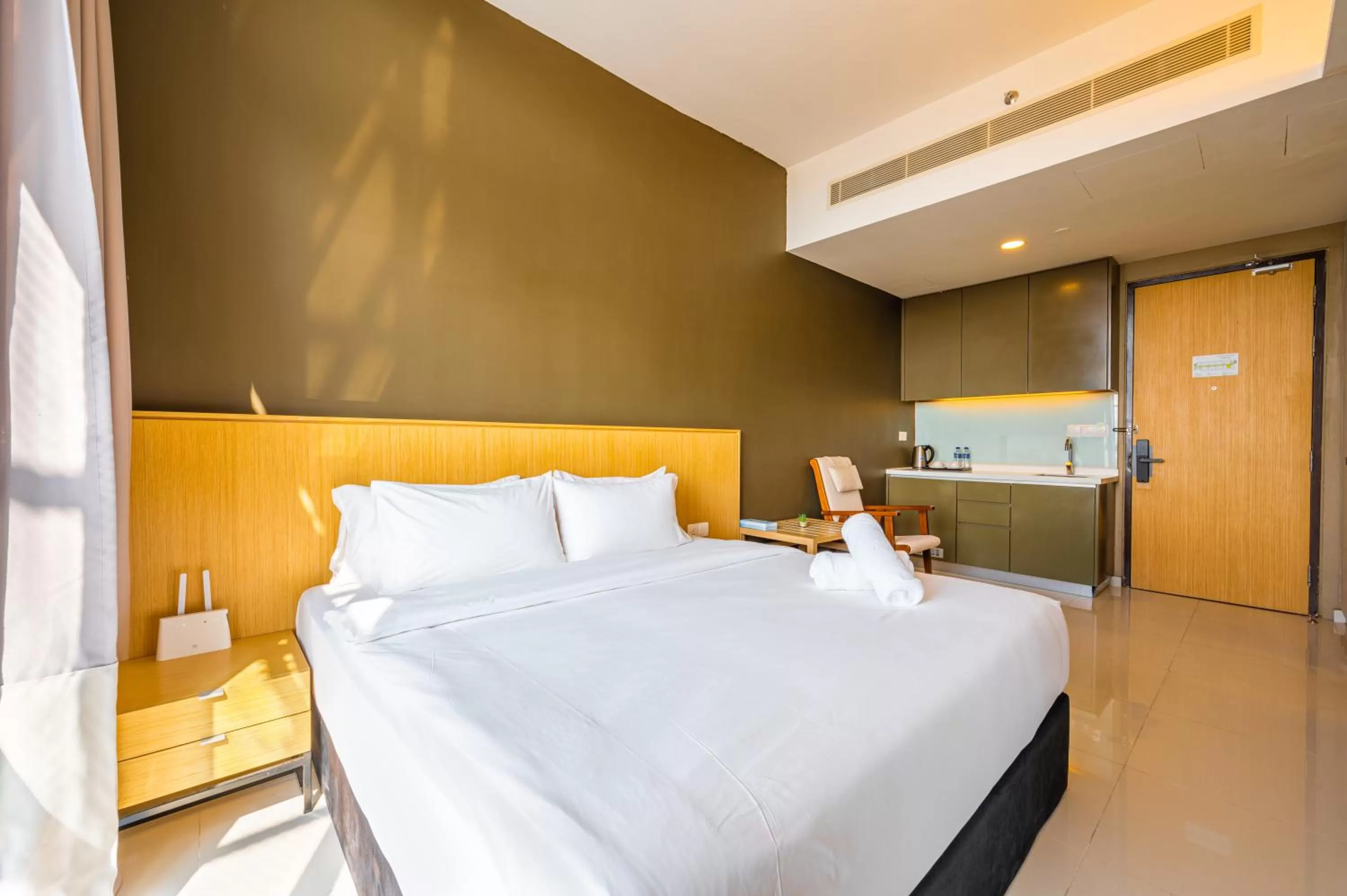 Bed in Greystone 99 Suites