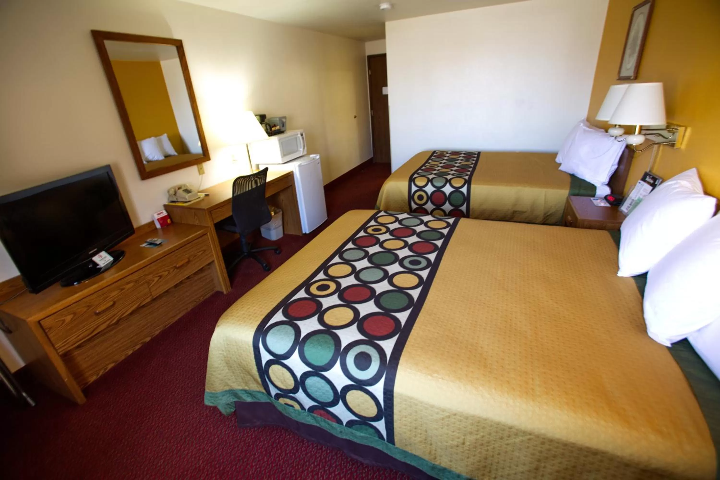 Decorative detail, Bed in Super 8 by Wyndham Elko