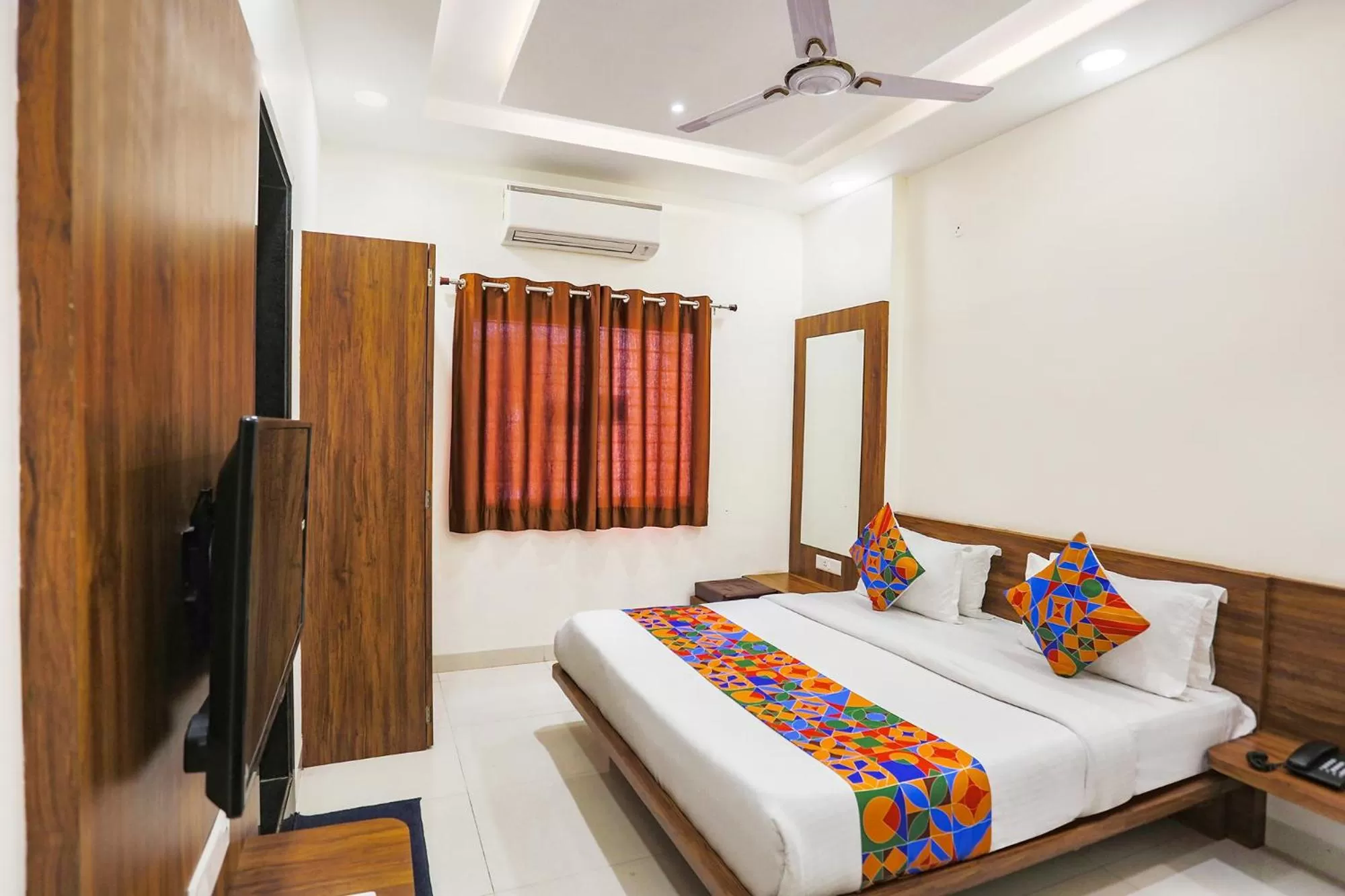 Bed in FabHotel Balaji Paradise