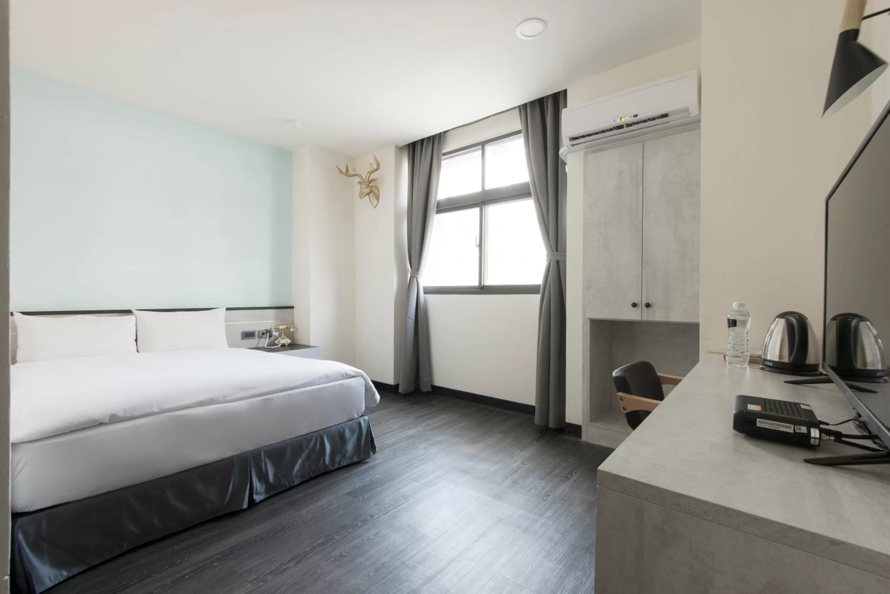 Bed in Raise Hotel Taichung