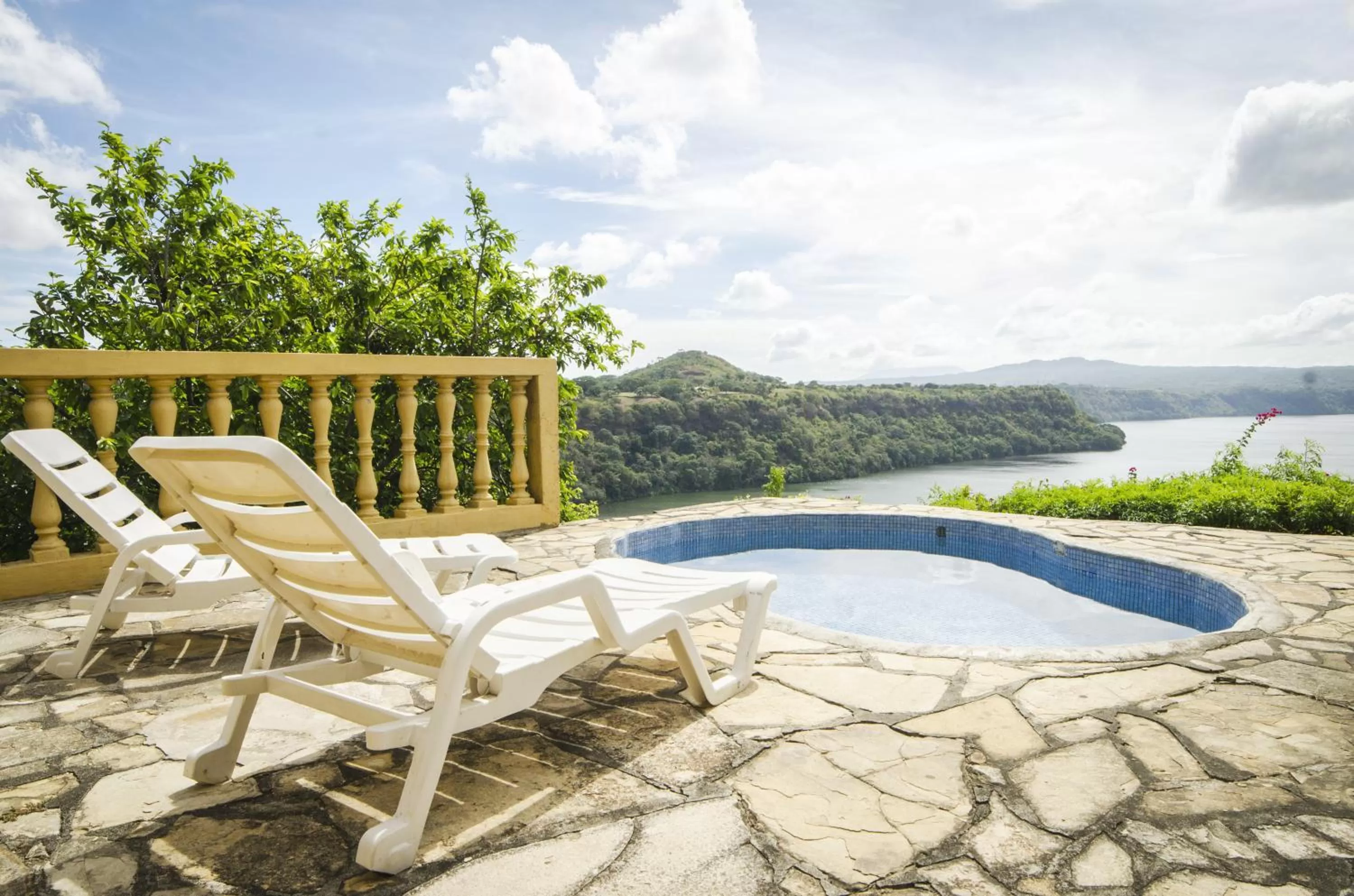 Balcony/Terrace, Swimming Pool in Las Cabañas Encantadas de Nindirí