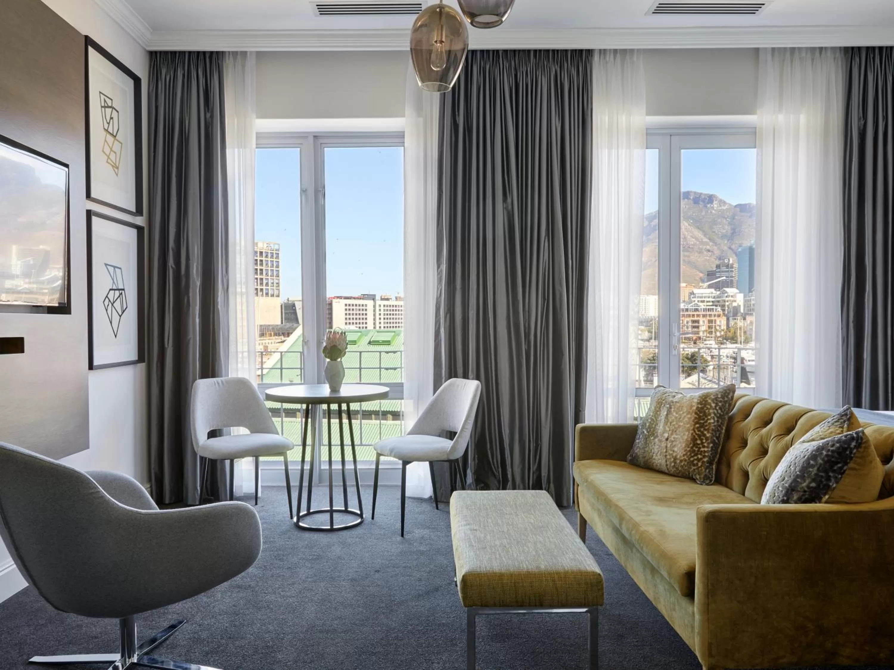Seating area in The Manor House at the Queen Victoria Hotel by NEWMARK