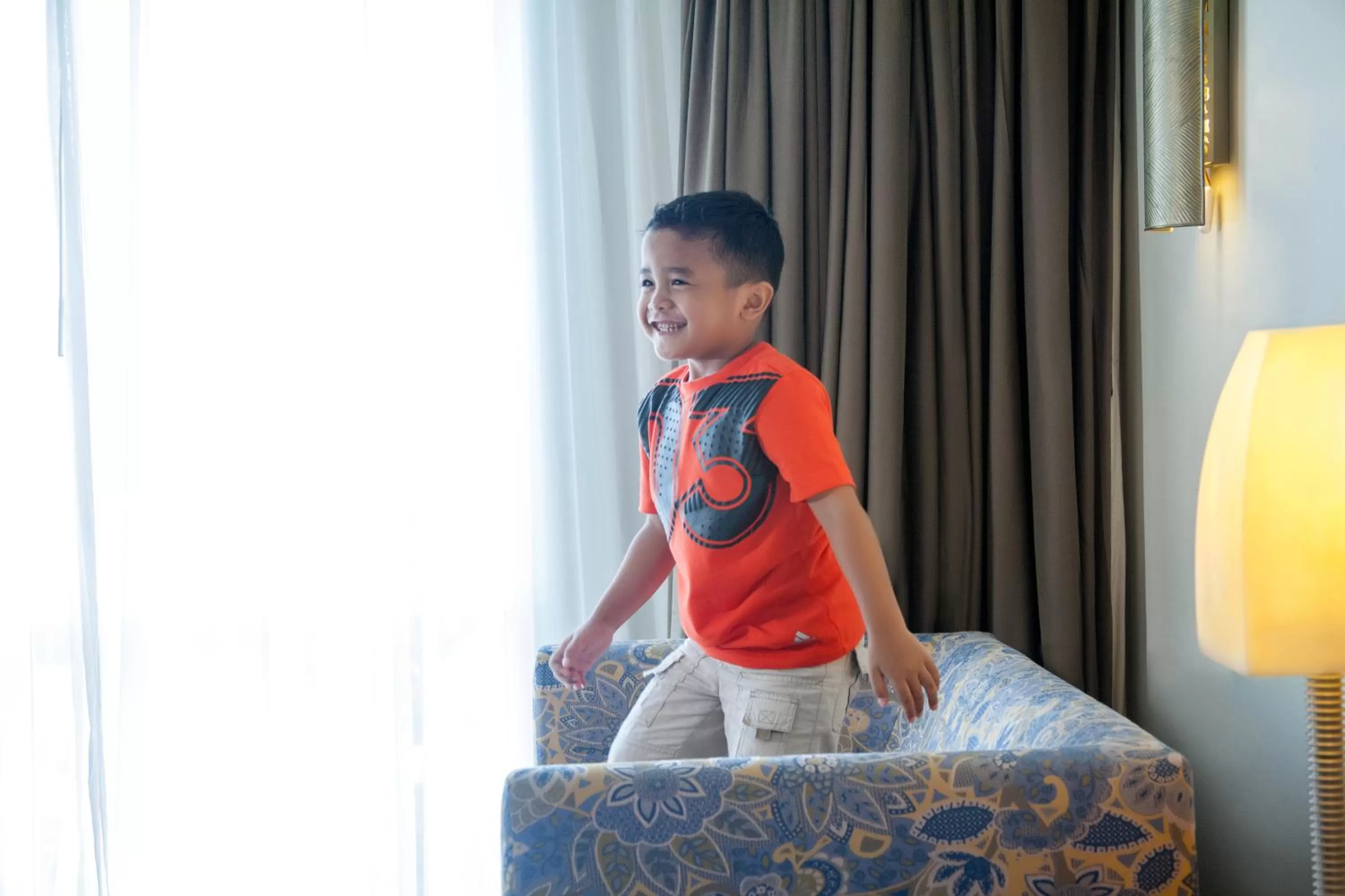 Seating area, Bed in Novotel Semarang