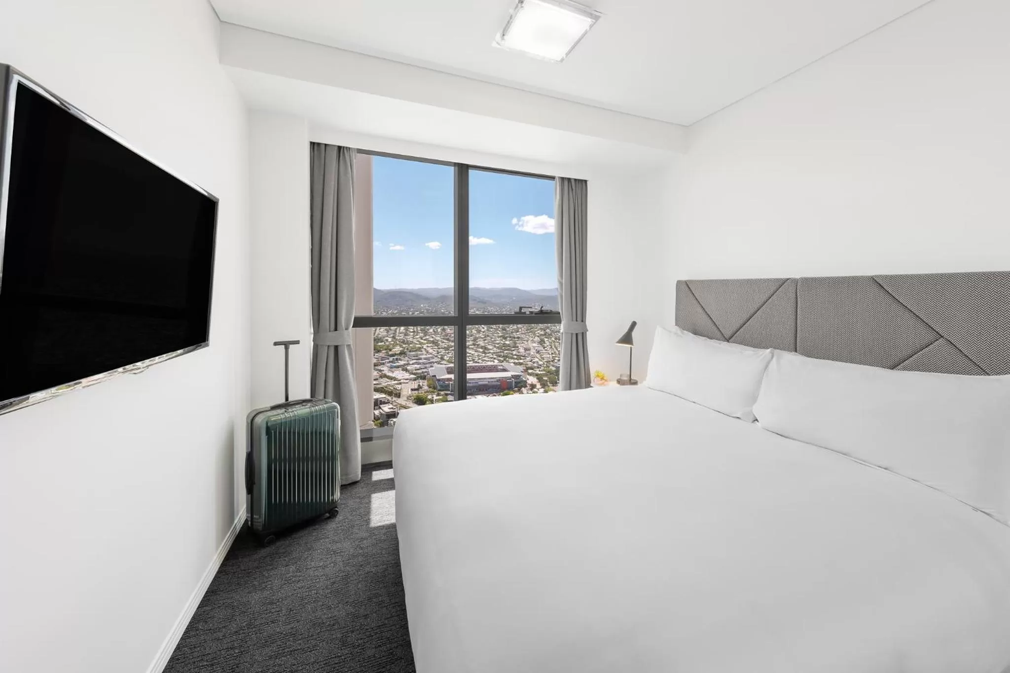 Bed in Meriton Suites Herschel Street, Brisbane