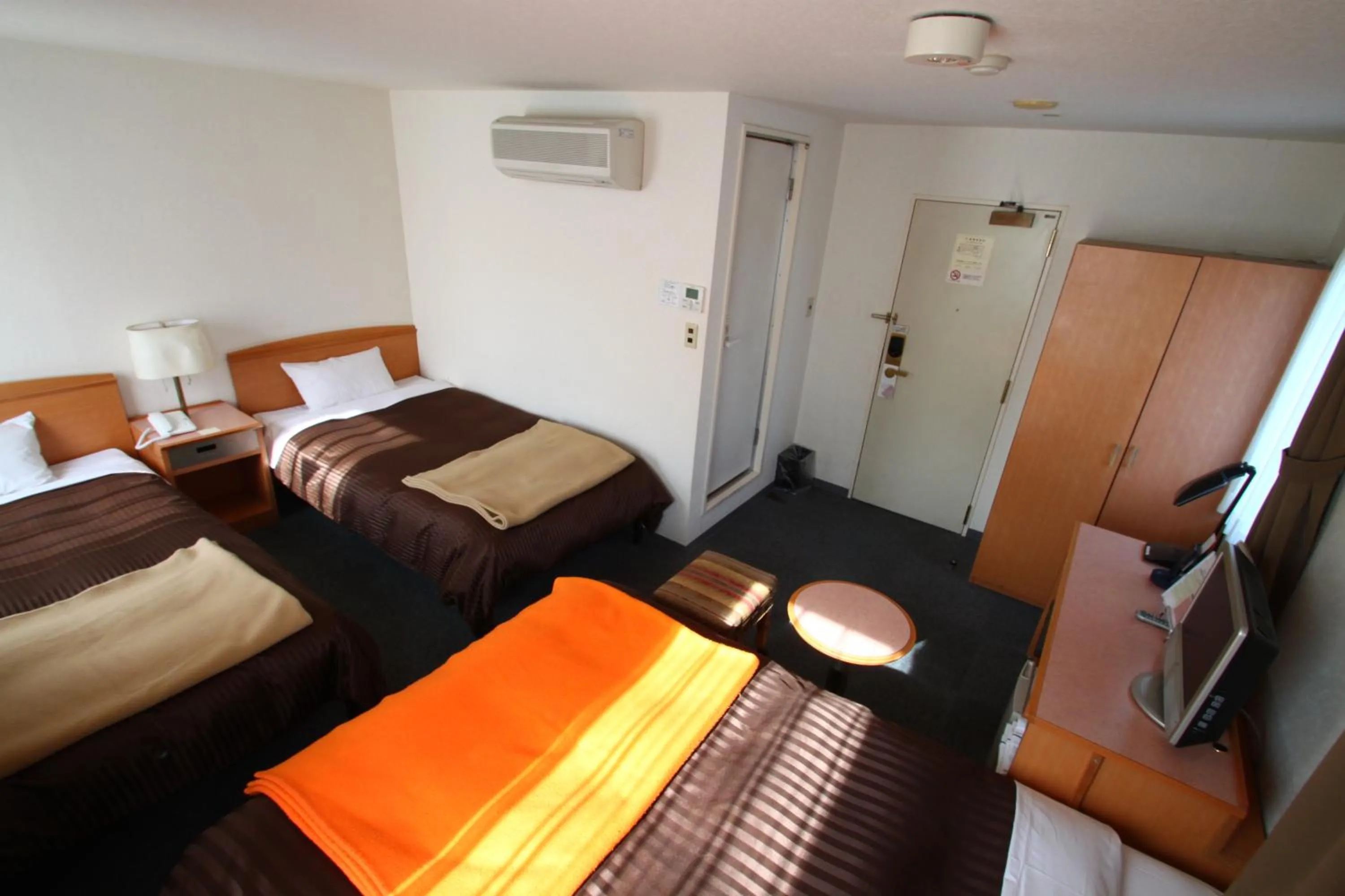 Bed in Sakura Hotel Hatagaya