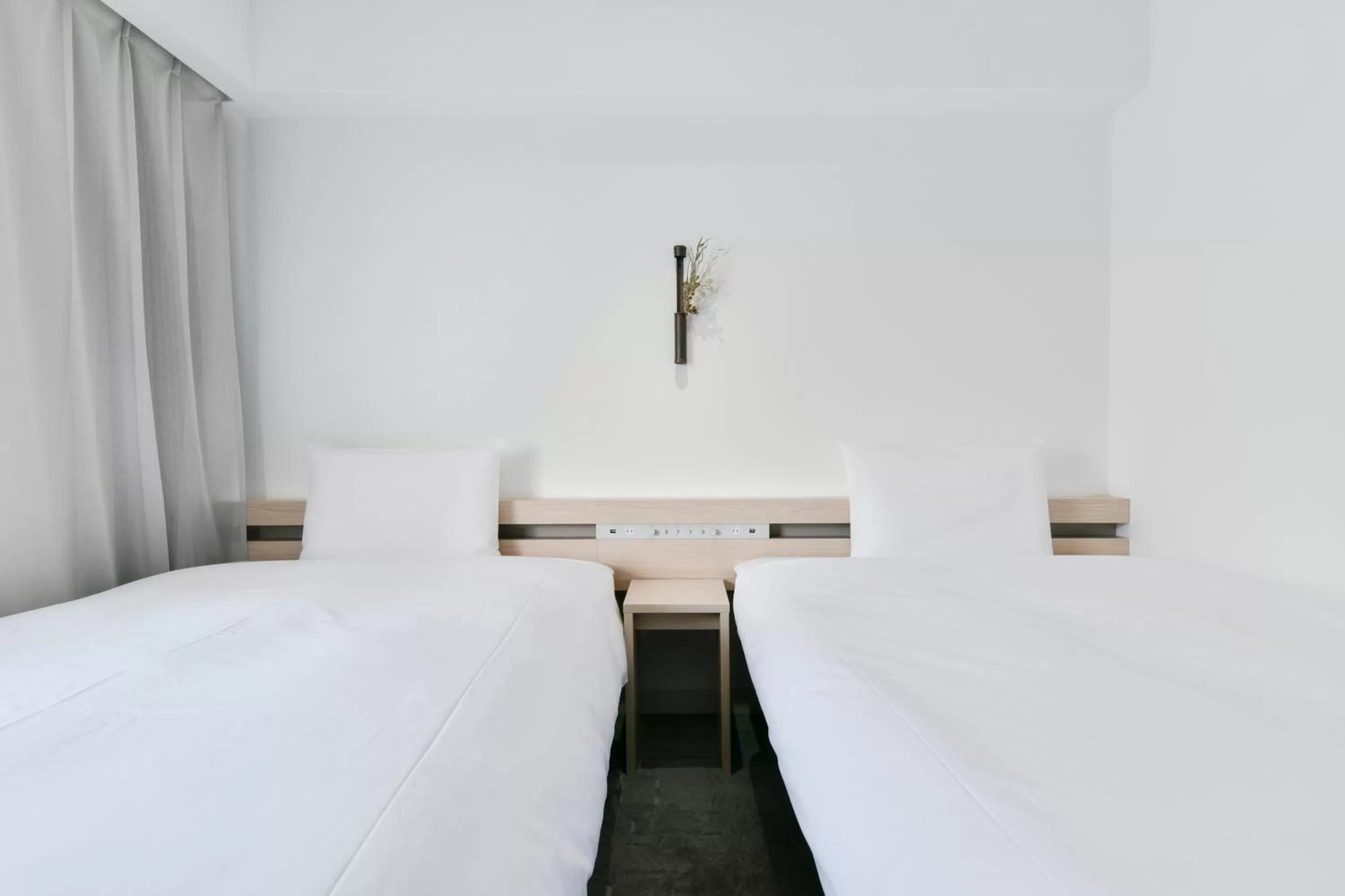 Bed in REF Kumamoto by VESSEL HOTELS