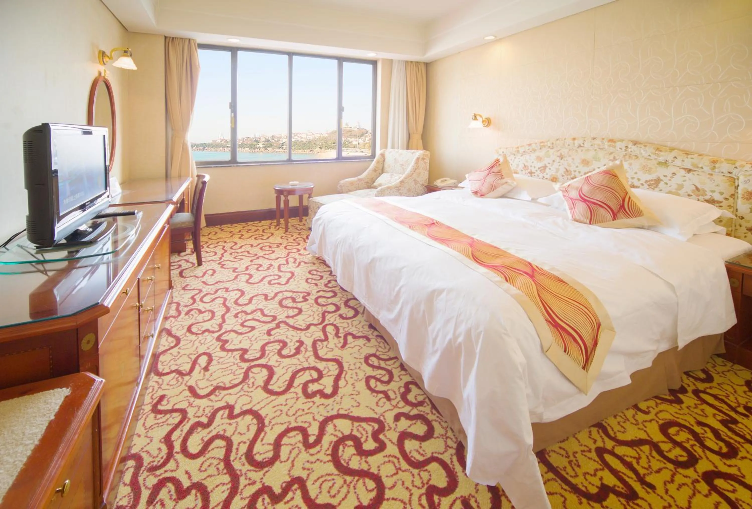 Bed in Huiquan Dynasty Hotel Qingdao