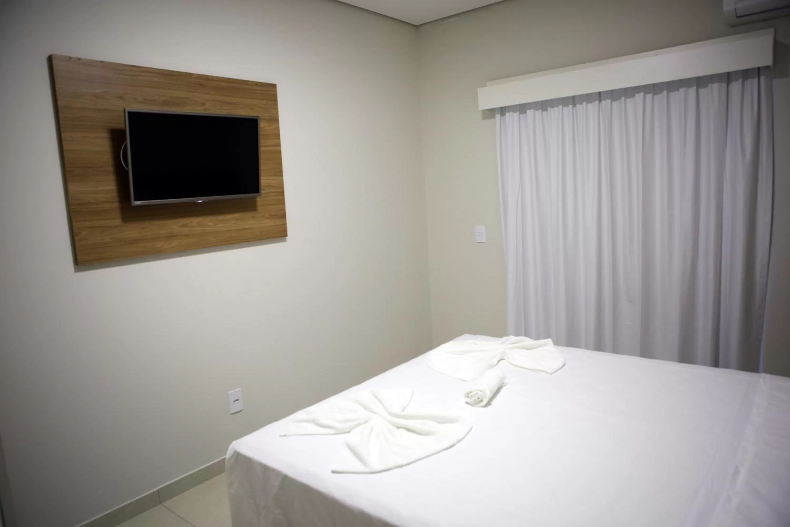 Bed in Regional Plaza Hotel Event Park