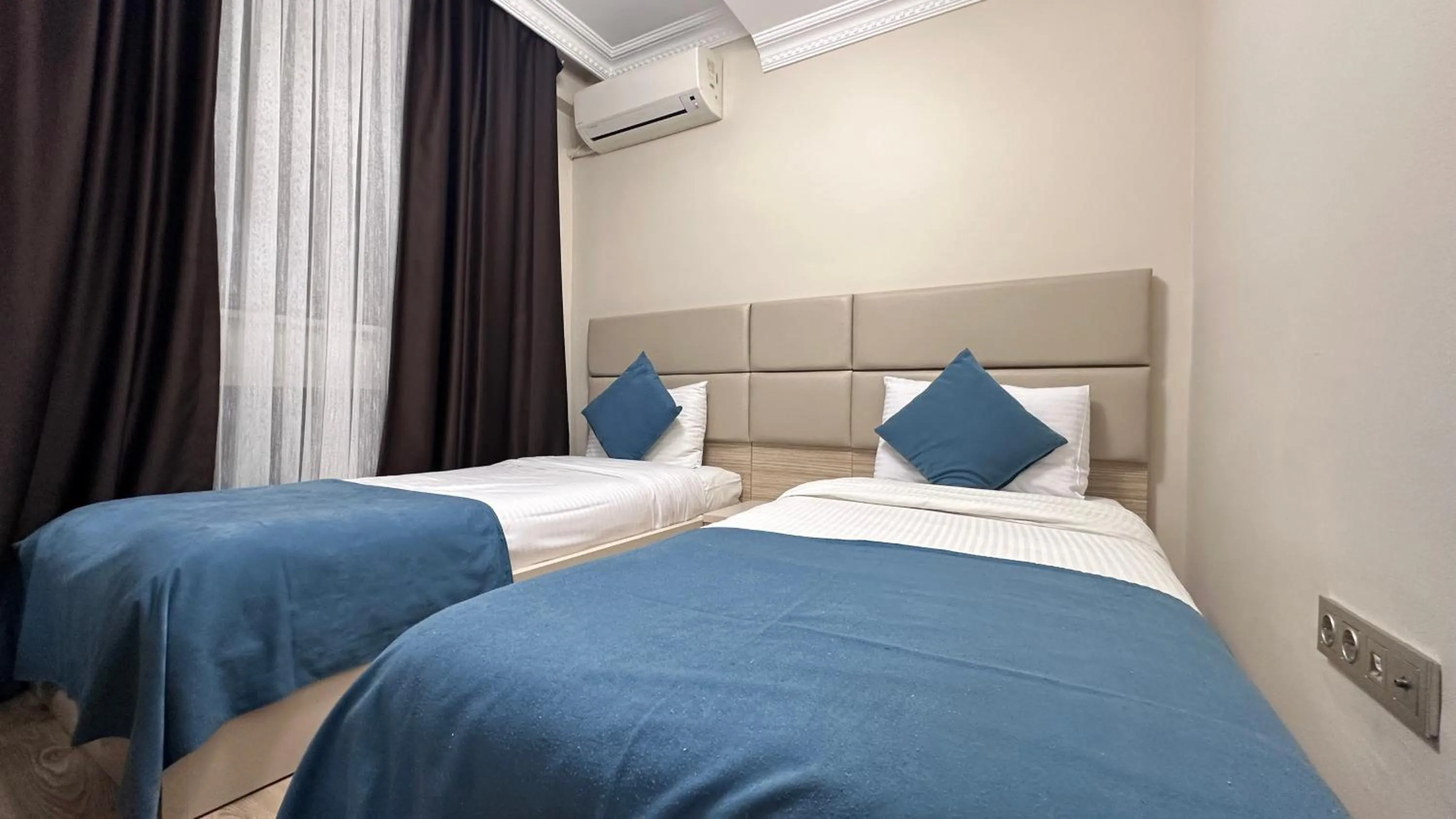 Bed in Overland Residence