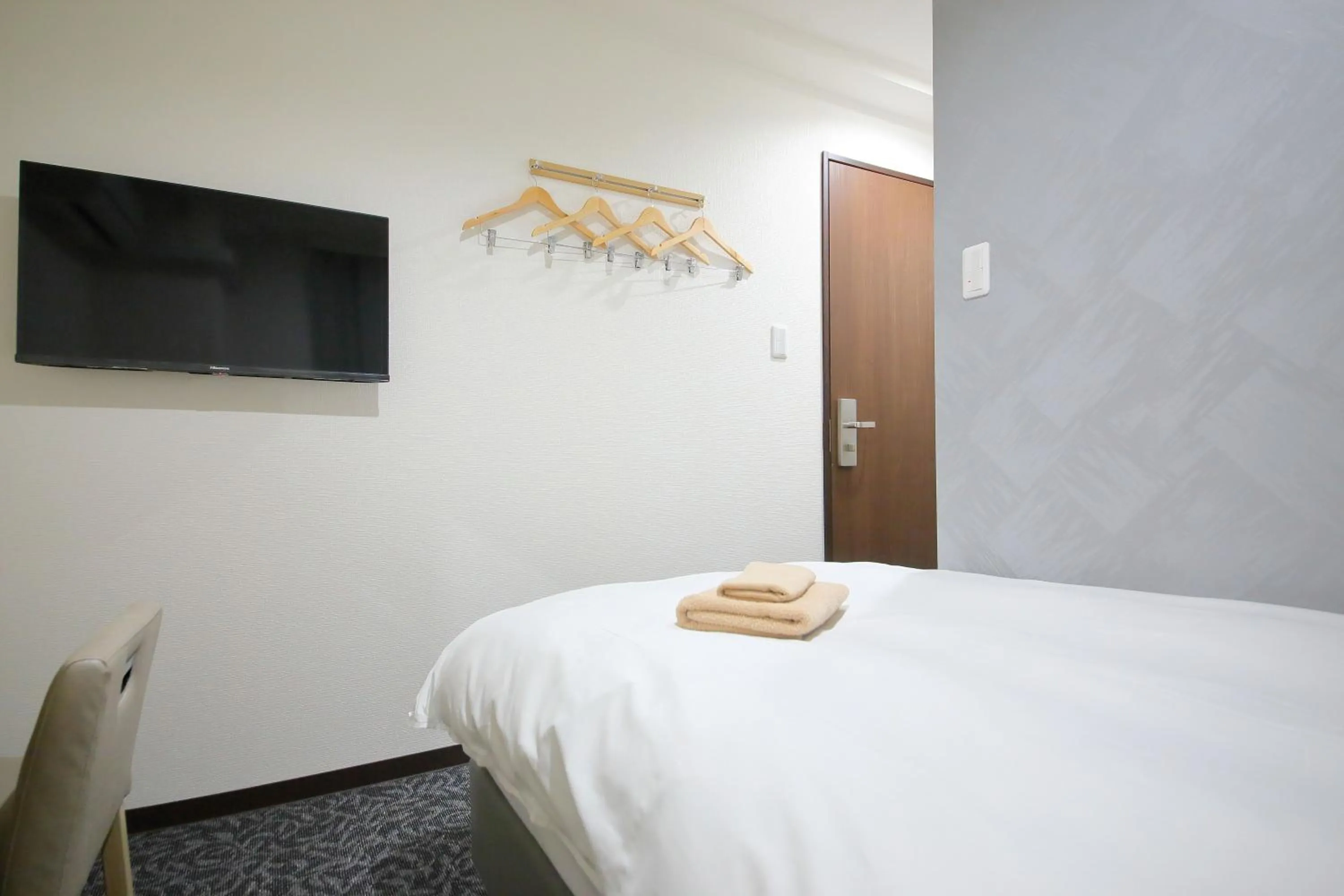 Bed in Hotel Shin-Imamiya